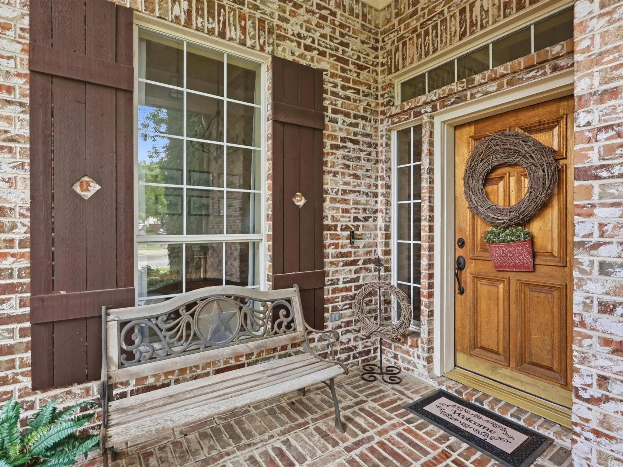 Welcome guests or sit and enjoy your morning coffee on the covered front porch.
