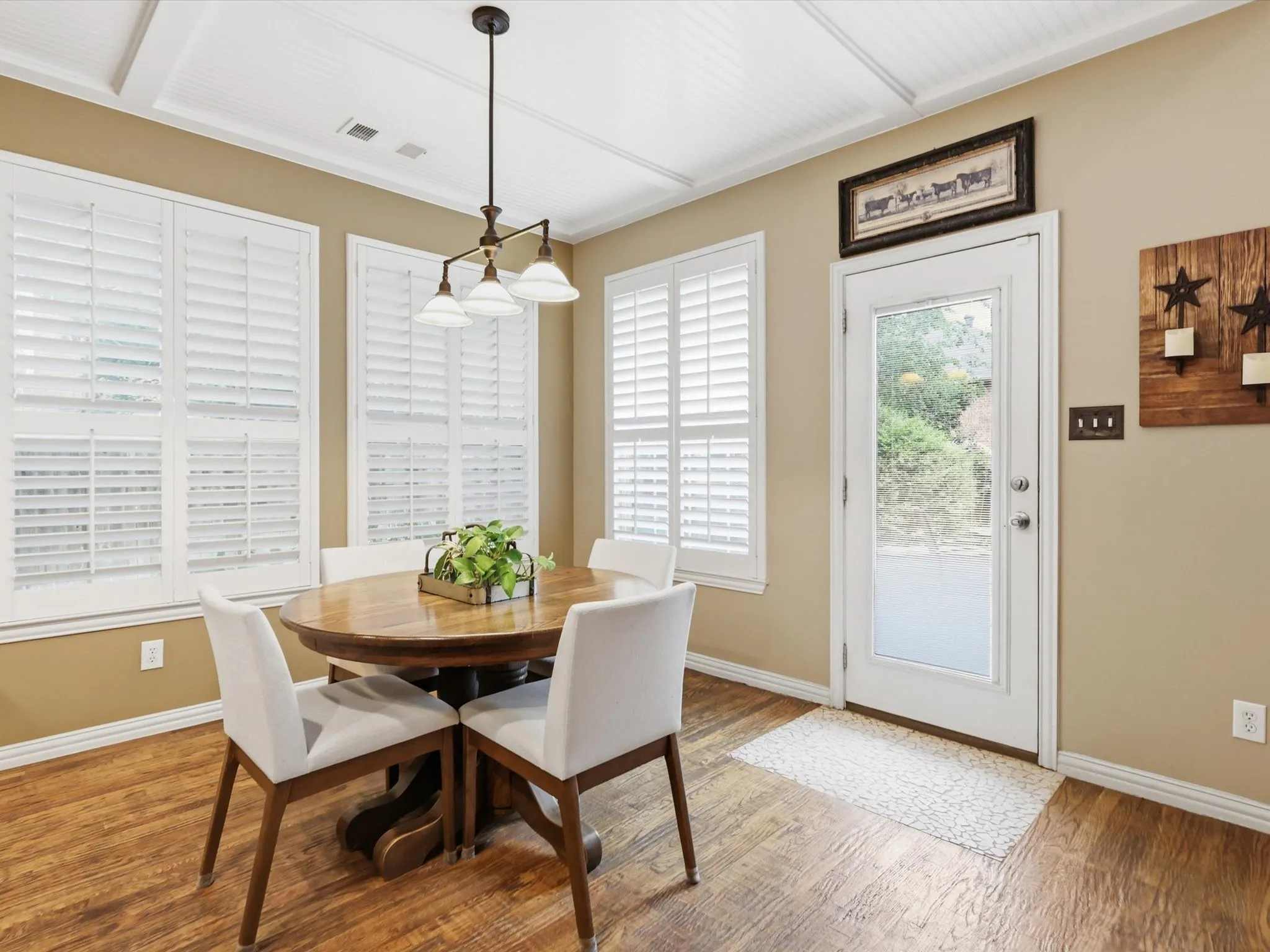 Entrance to the backyard located conveniently off the kitchen for outdoor meals or entertaining.