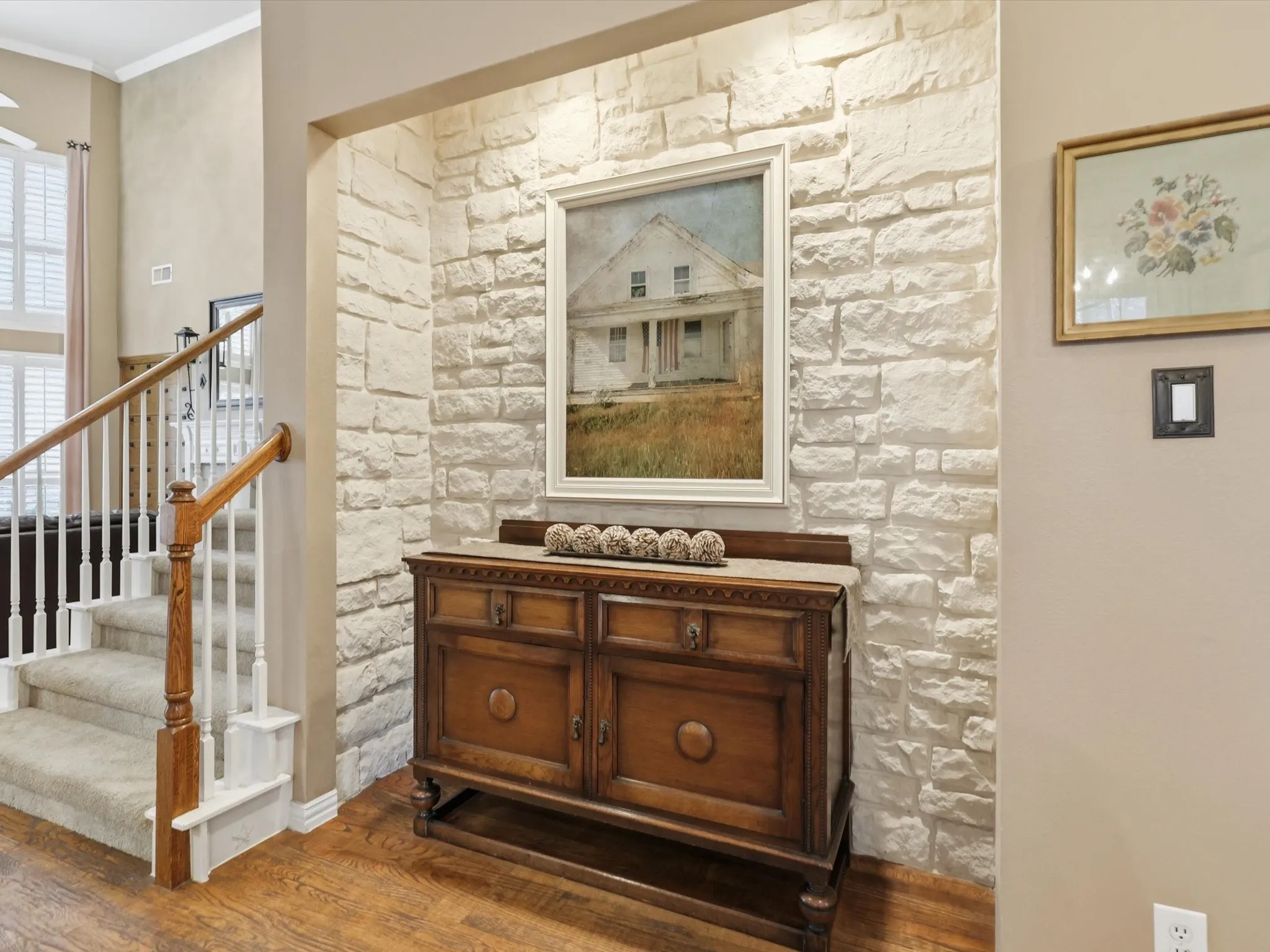 Stone accented front foyer area is one of many small details that make this home special.