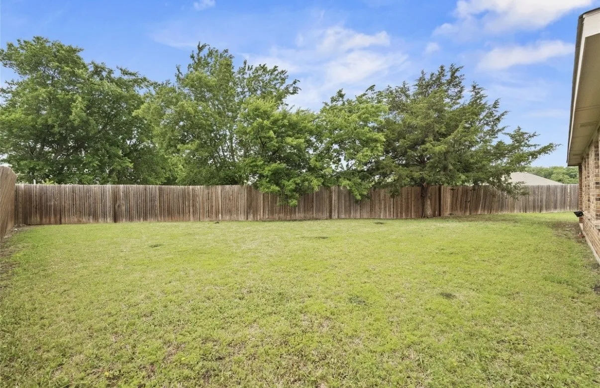 Backs up to tree-lined greenbelt.