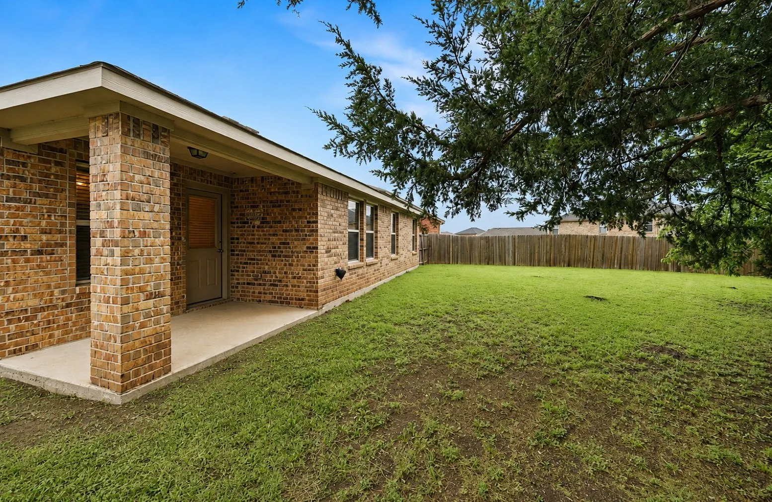 Backs up to tree-lined greenbelt.