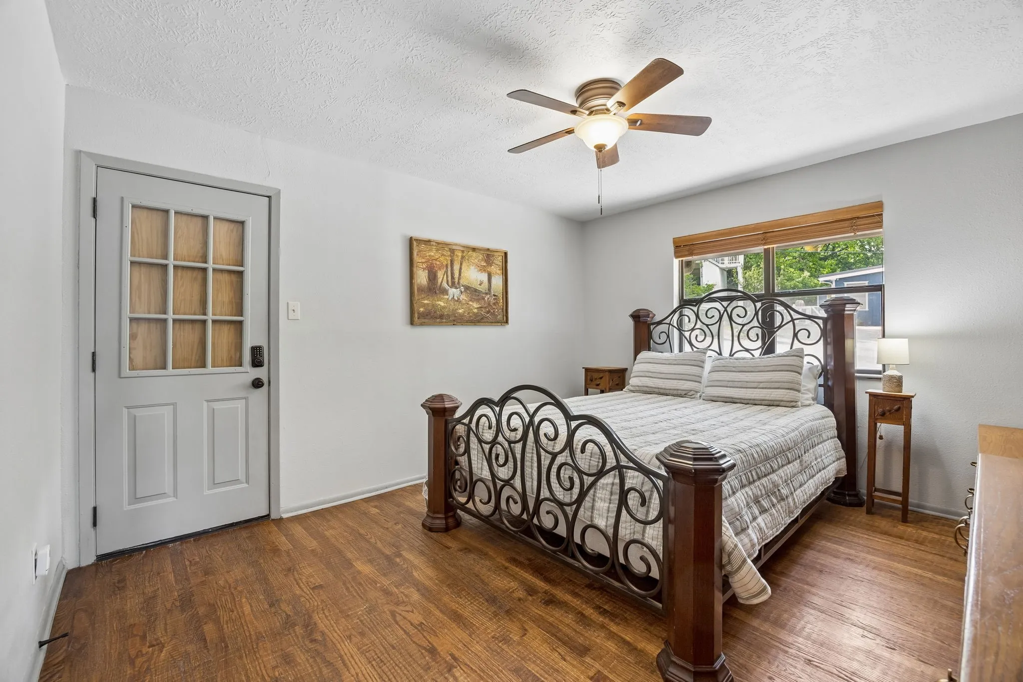 Spacious bedroom with beautiful built in wood cabinets