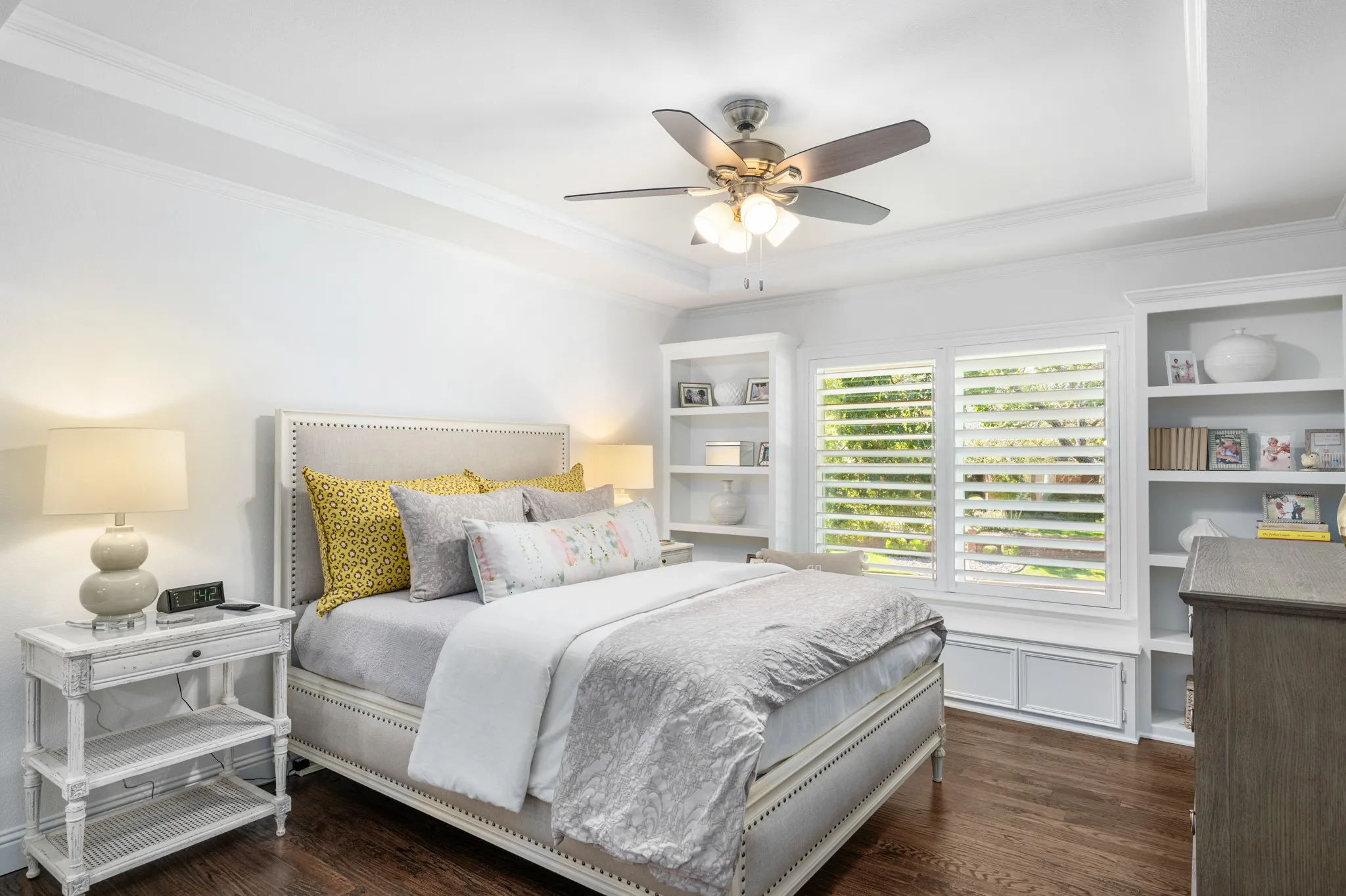 Secondary bedroom with built-ins beside and under the window and en-suite bath.