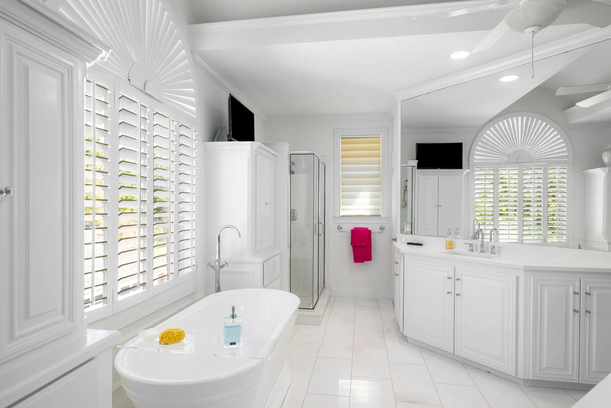 A new tub, dual vanities, tile flooring and dual storage cabinets are additions.