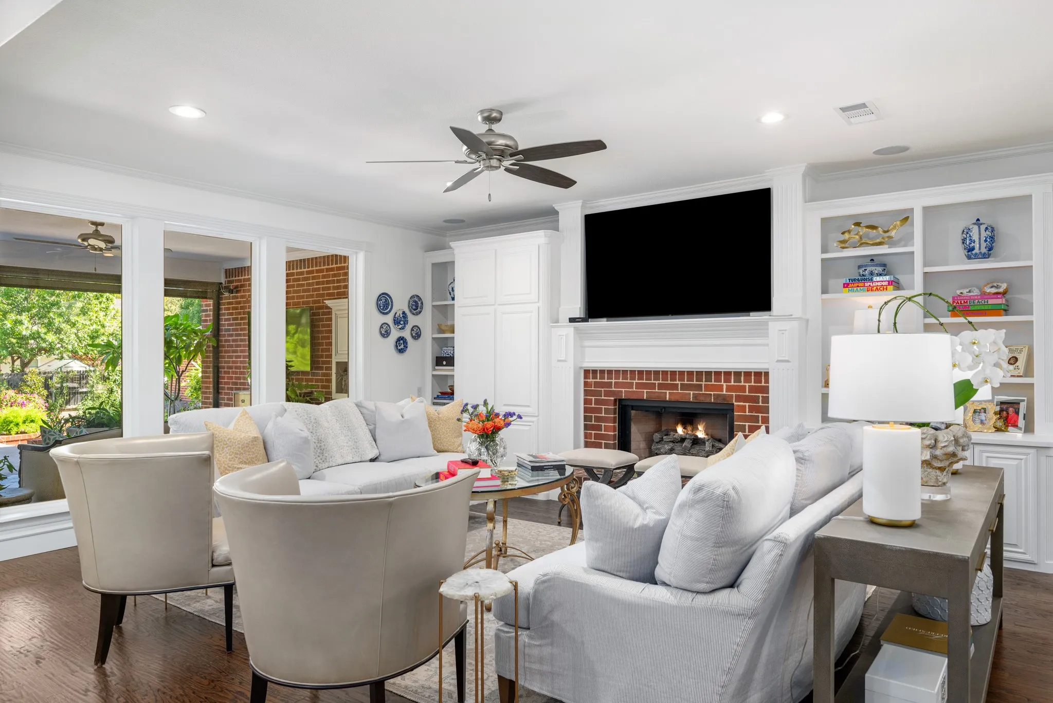 Charming and filled with ambiance, the family room features built-ins and offers a view of the back porch and yard.