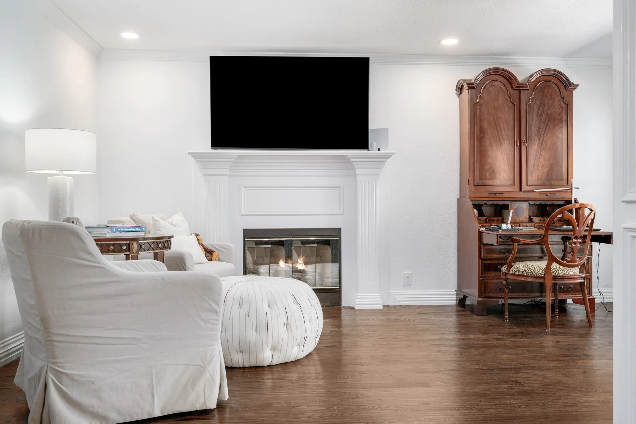 A fireplace is found in the primary bedroom sitting area.