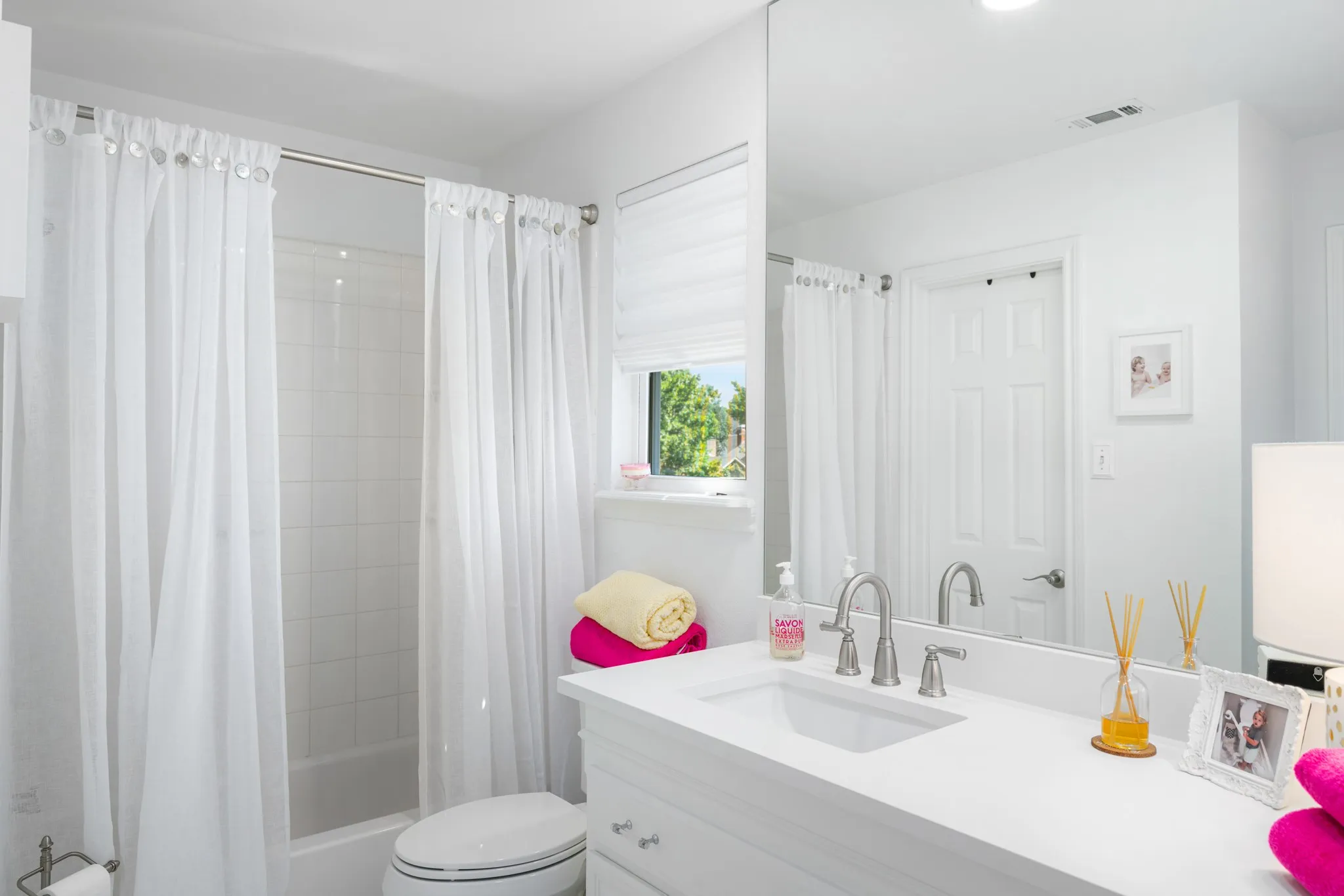 The bathrooms have been updated with new fixtures and quartz counter tops.