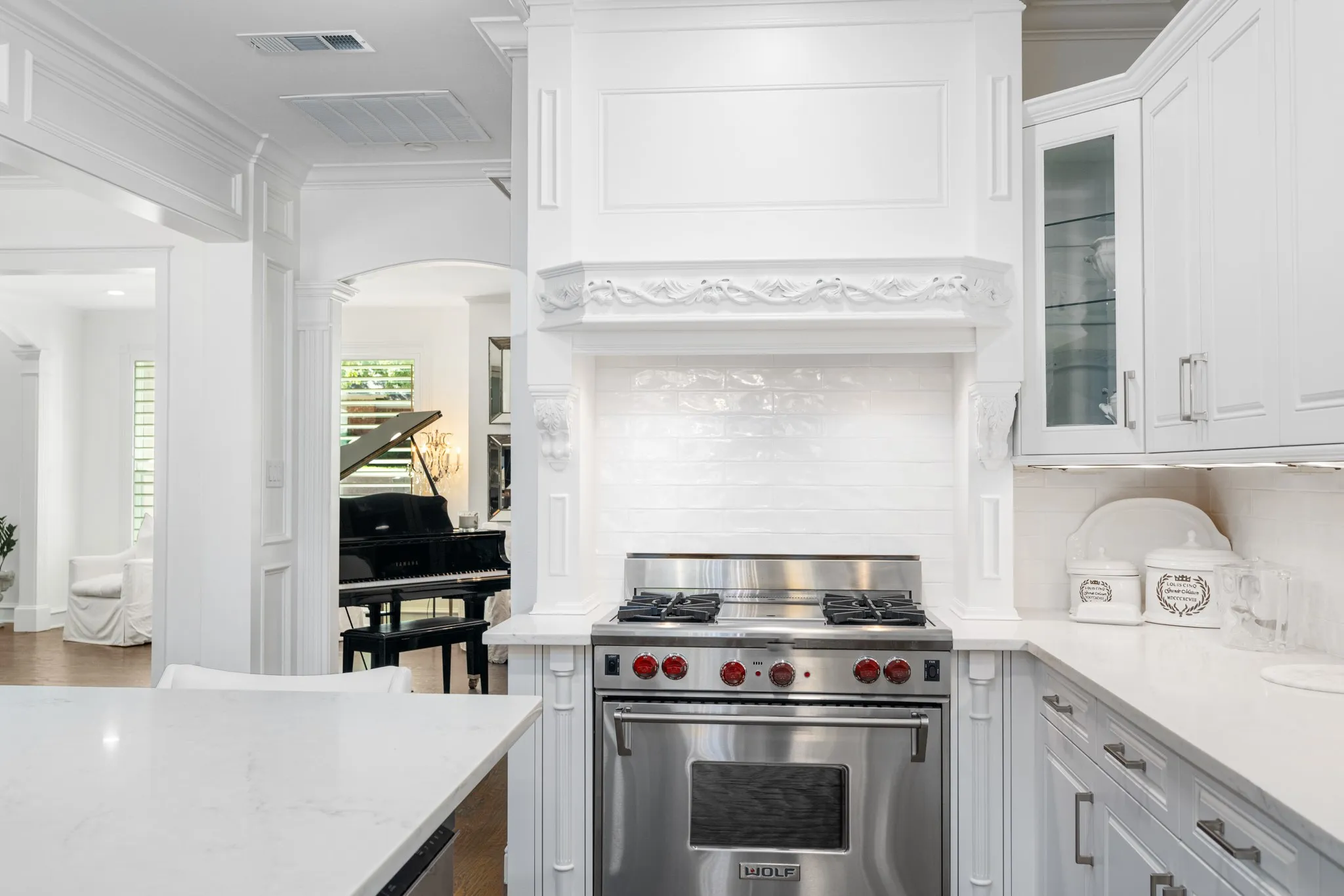 The Wolf gas stove and vent are touches a chef will enjoy.