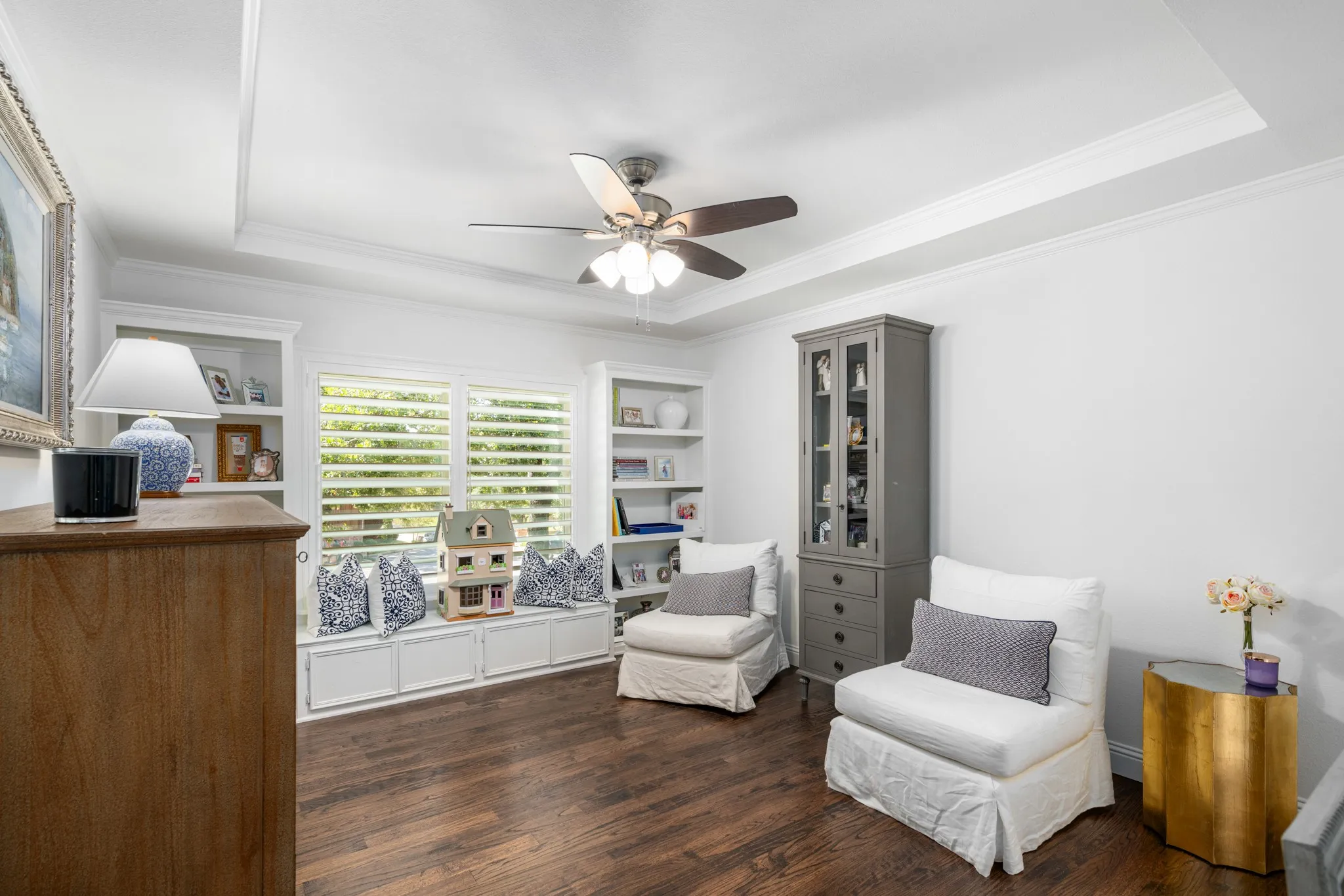 The third bedroom has a window seat with built in storage under.