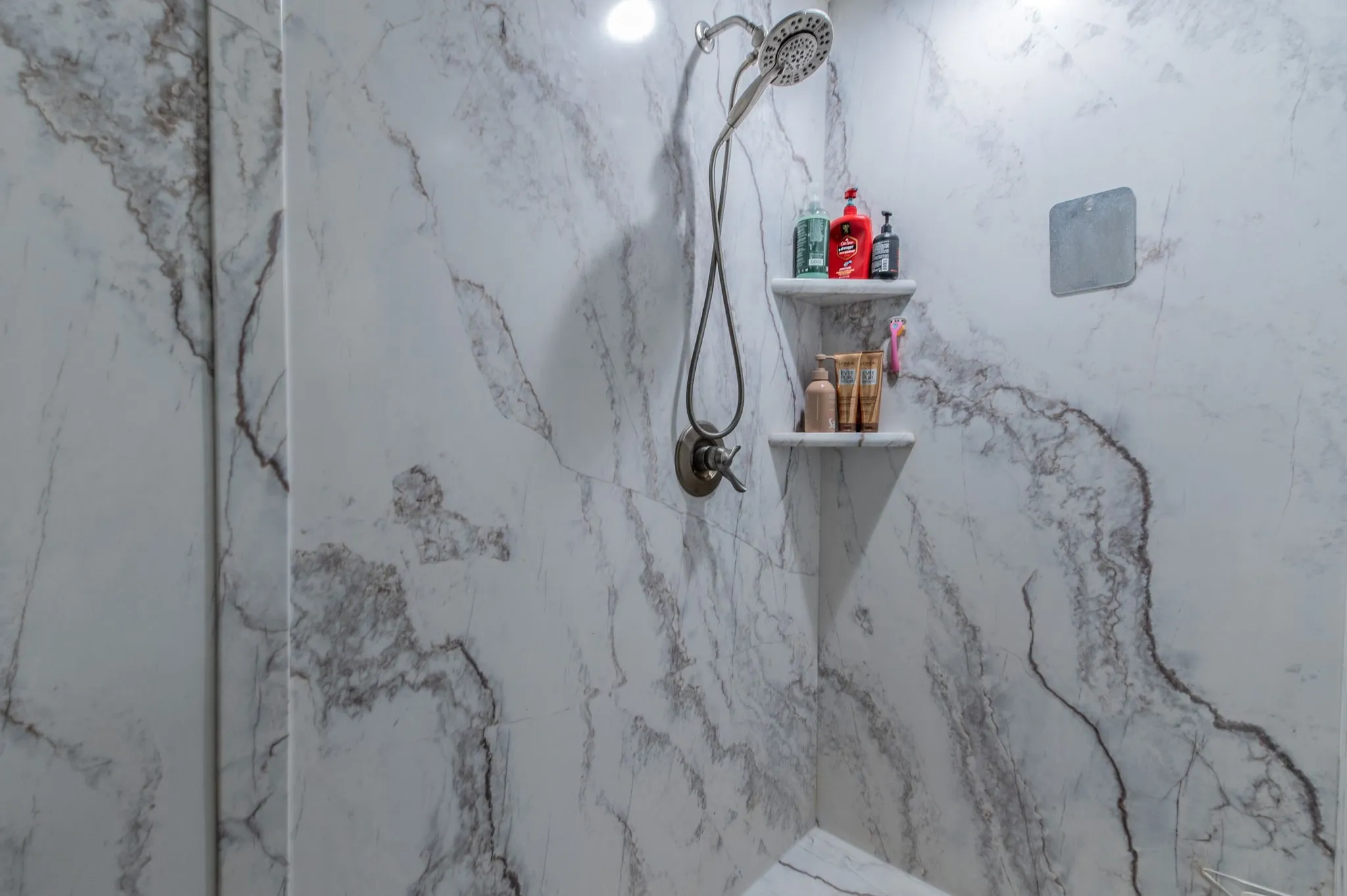 Bathroom with large walk-in shower.
