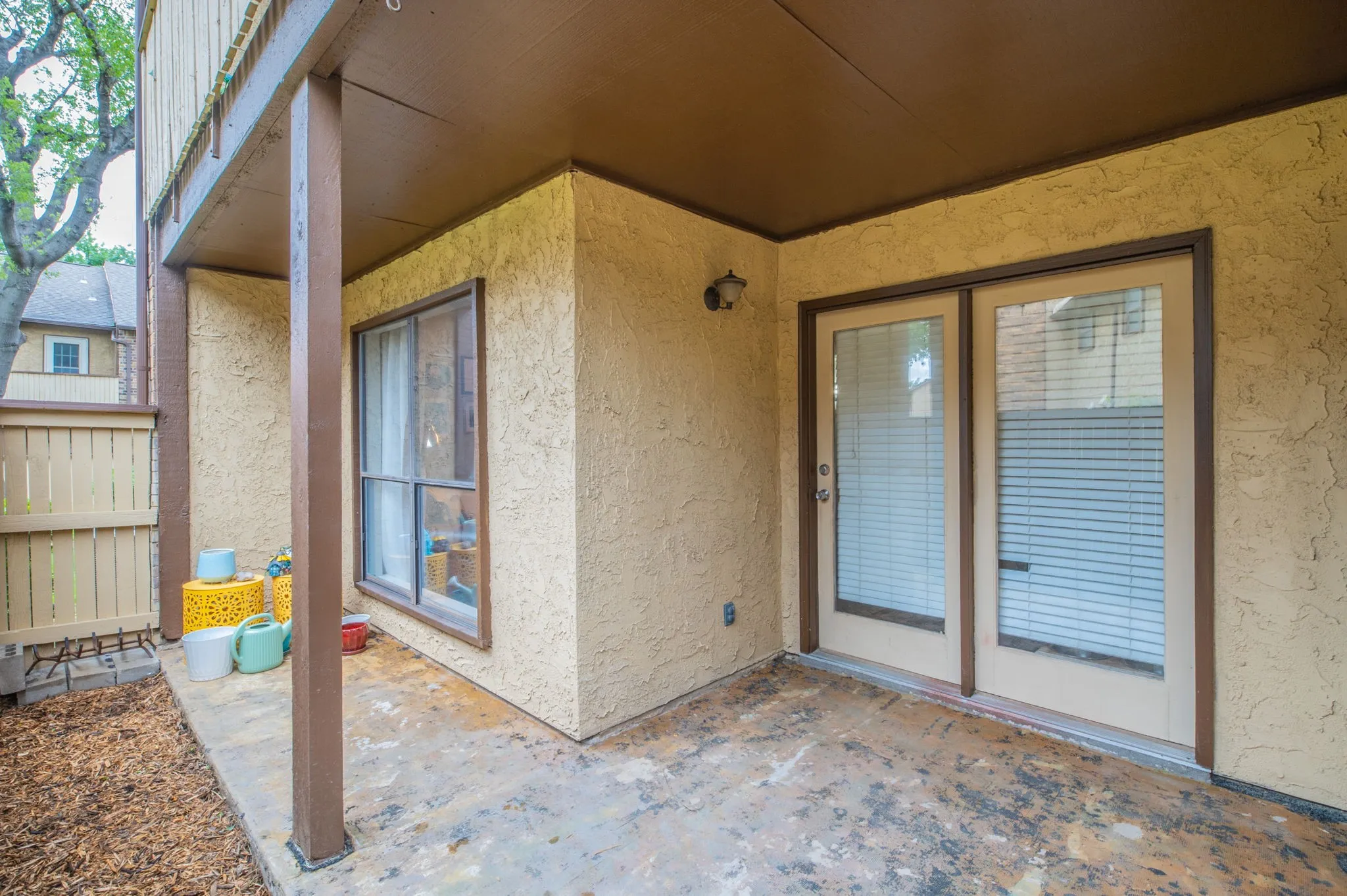Private covered patio is perfect for pets or outdoor relaxation.