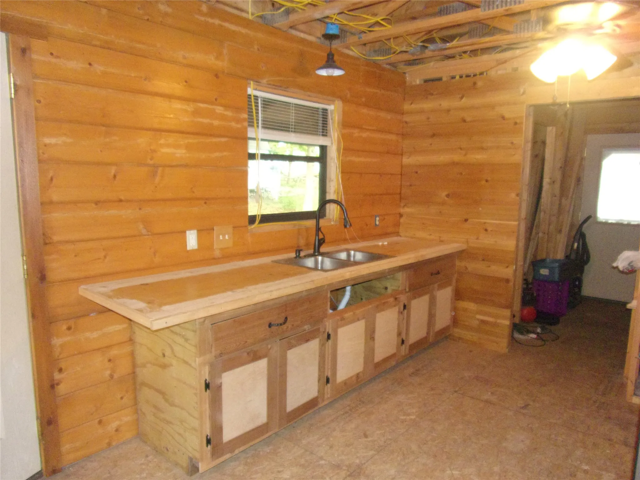 another view of kitchen sink and counter space