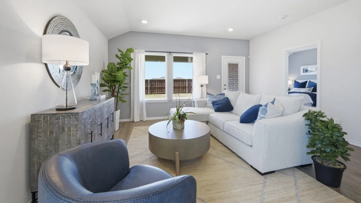Living area featuring wood-finish flooring and light gray walls