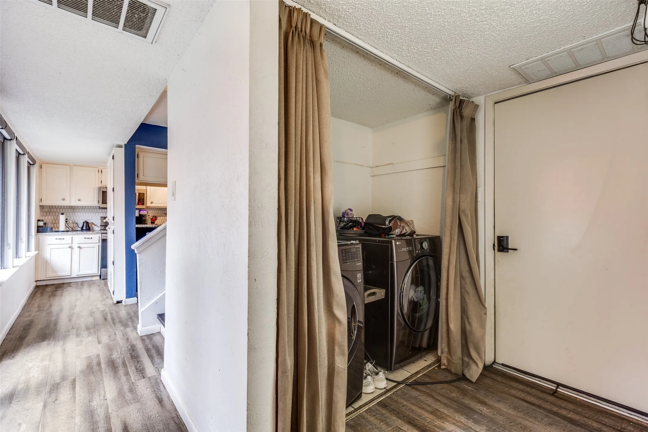 Full laundry in hallway