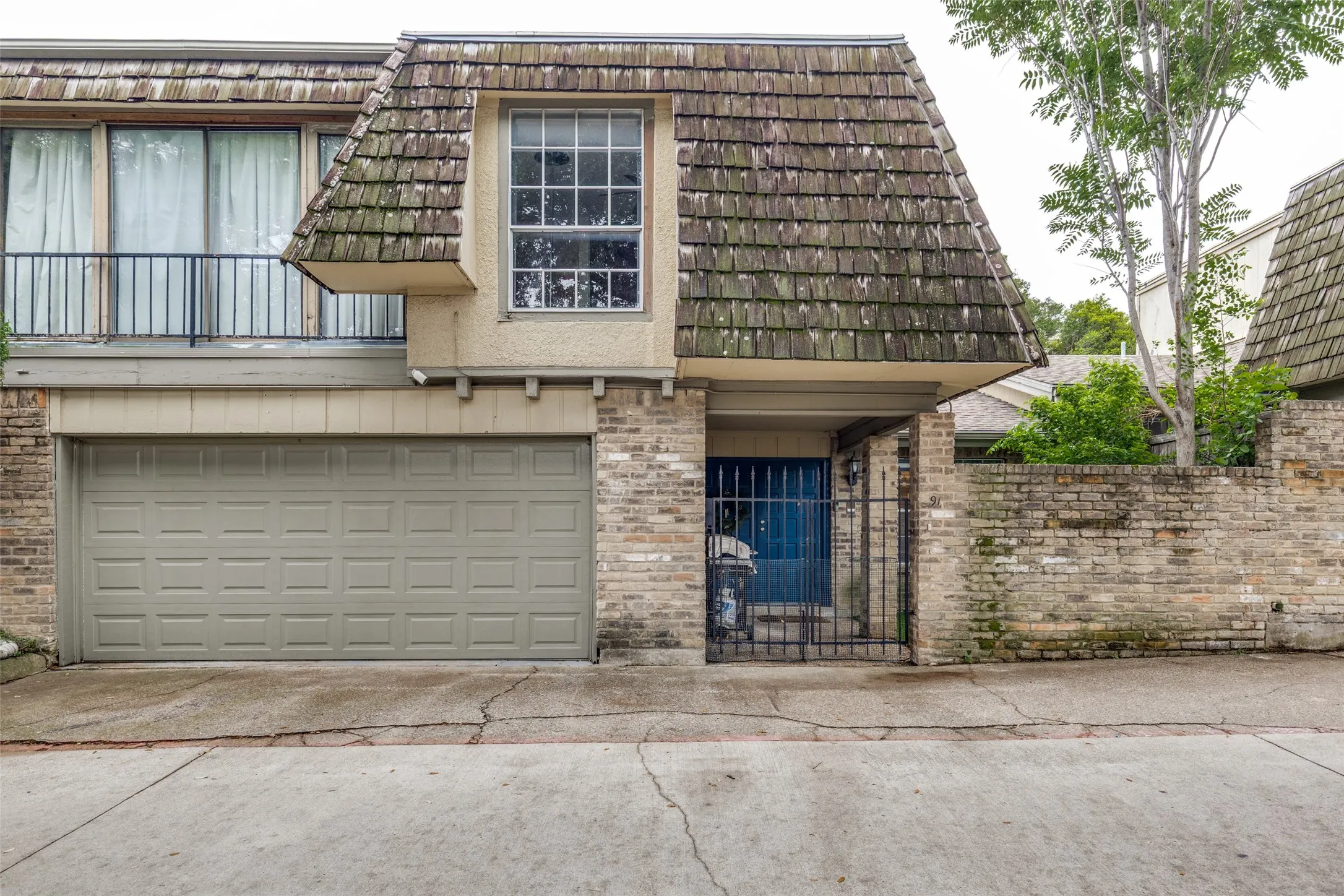 Front of home with attached 2-car garage