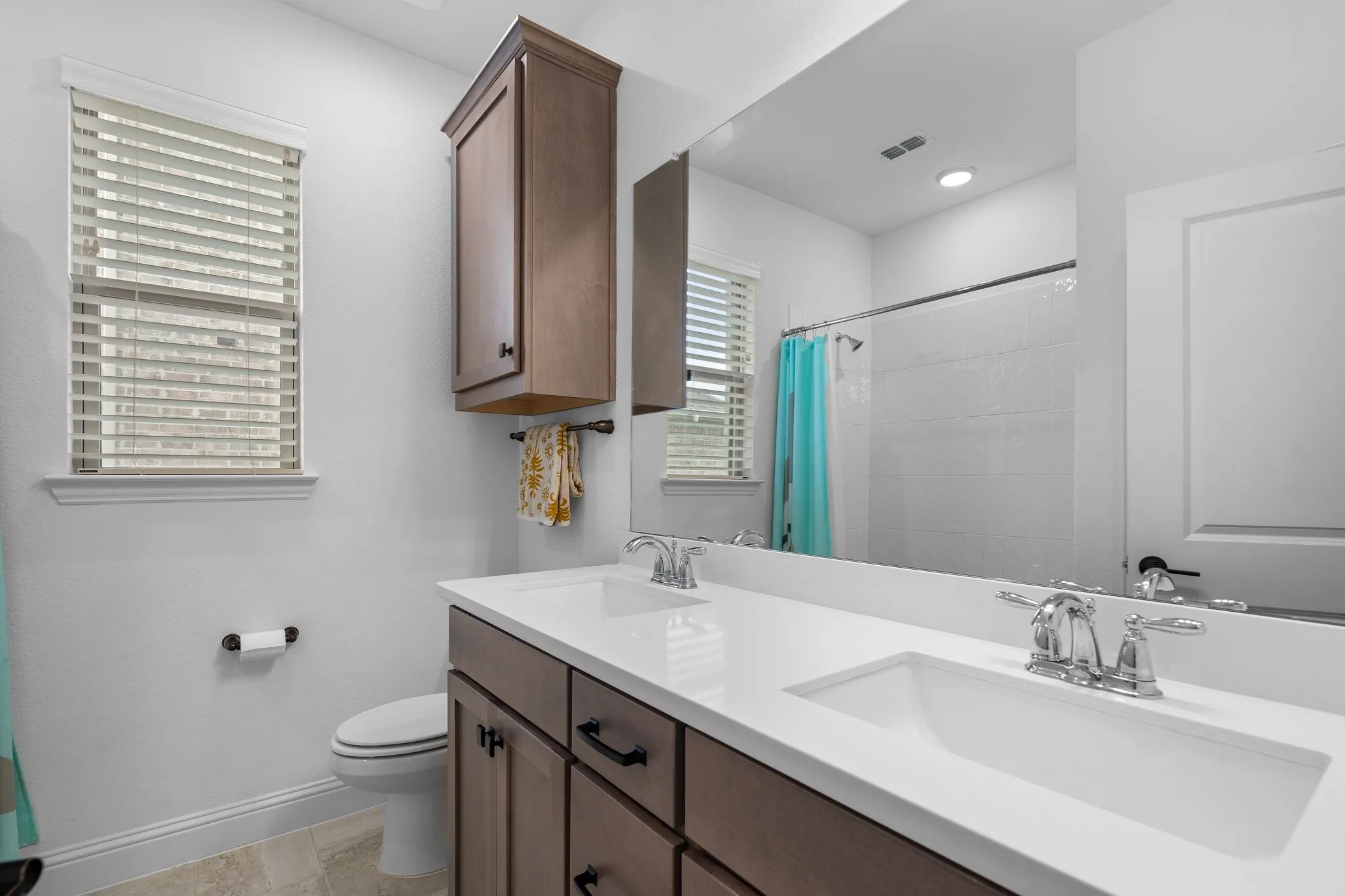 Full Bath with Dual Sinks and Extra Storage