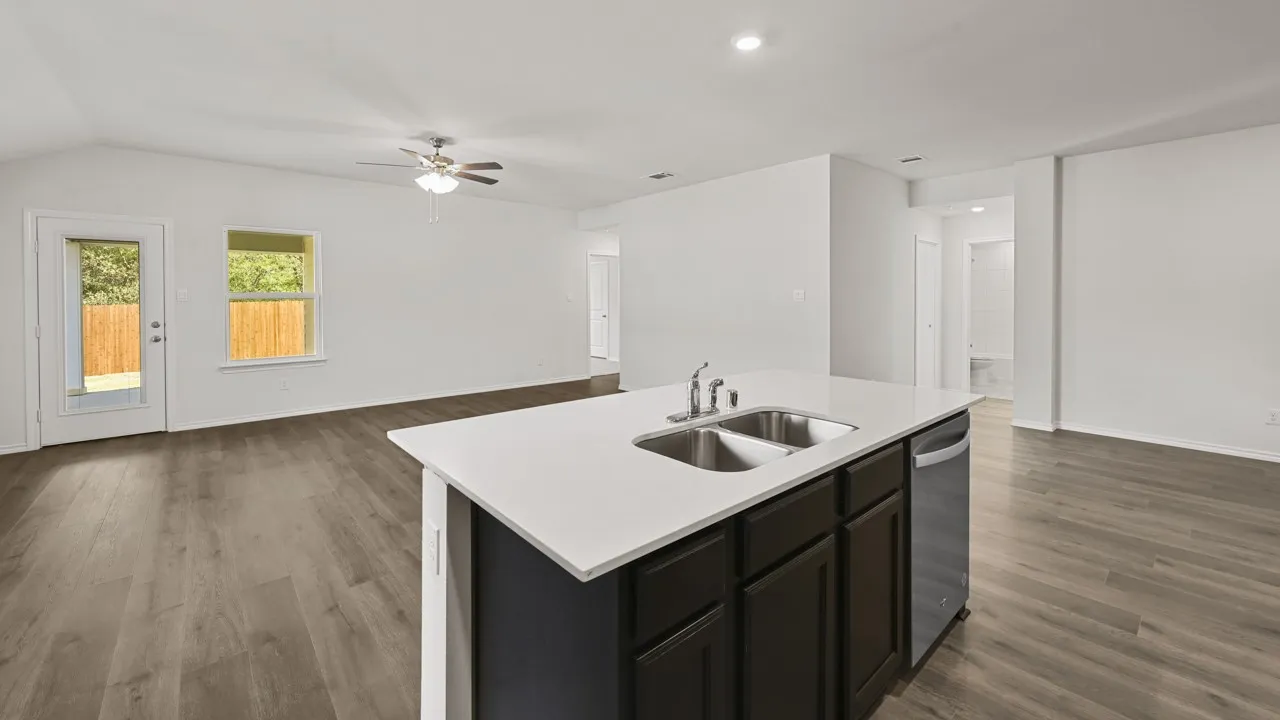 Kitchen island with dual stainless steel sink and stainless steel dishwasher