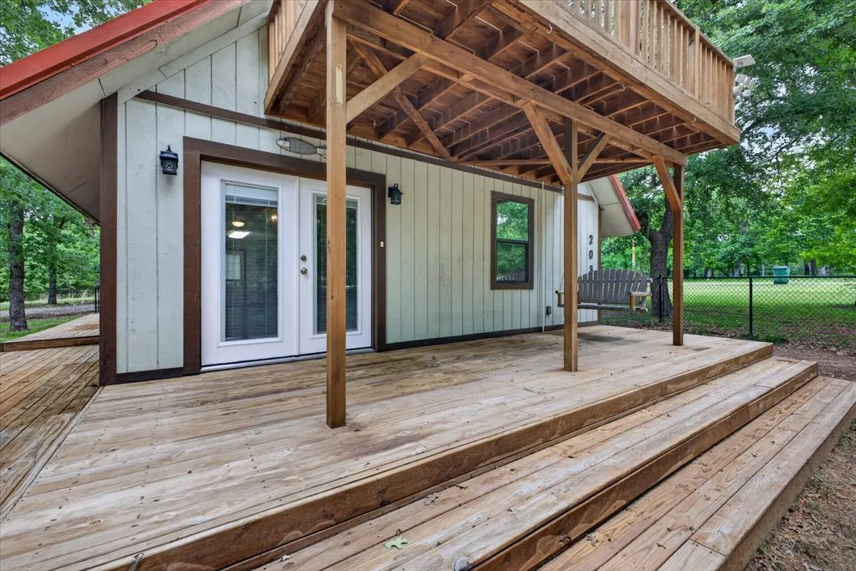 Wrap around porch with covered front and open balcony