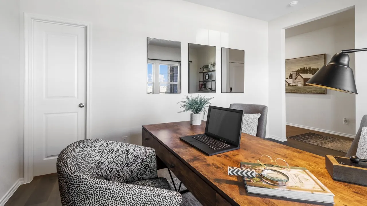 Versatile room featuring wood-finish flooring and a solid panel door
