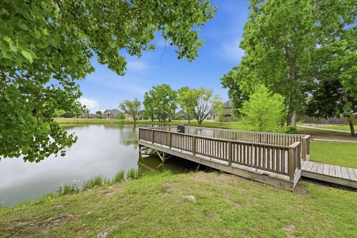 View of the community pond with dock