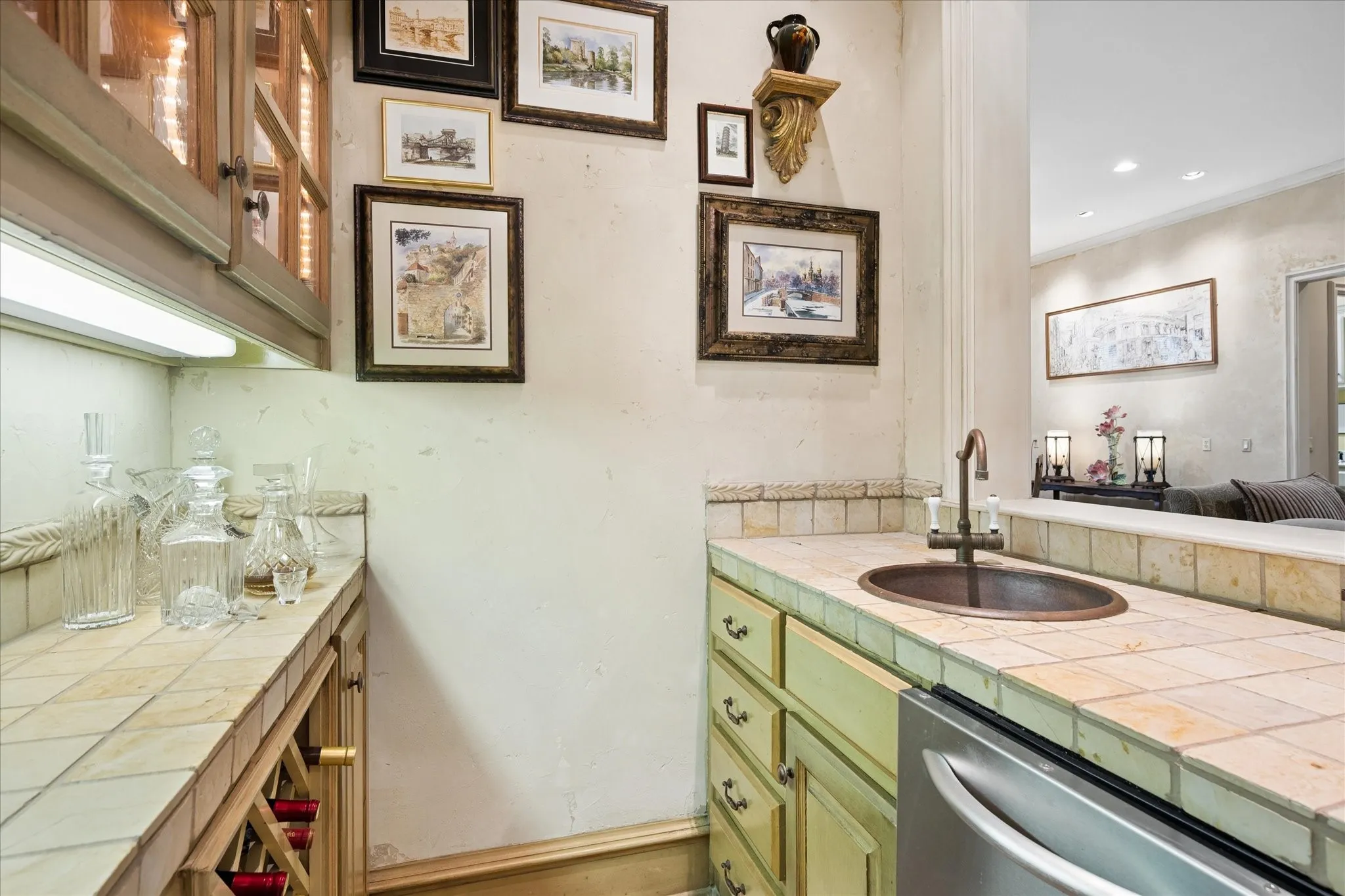 With copper sink and wine refrigerator
