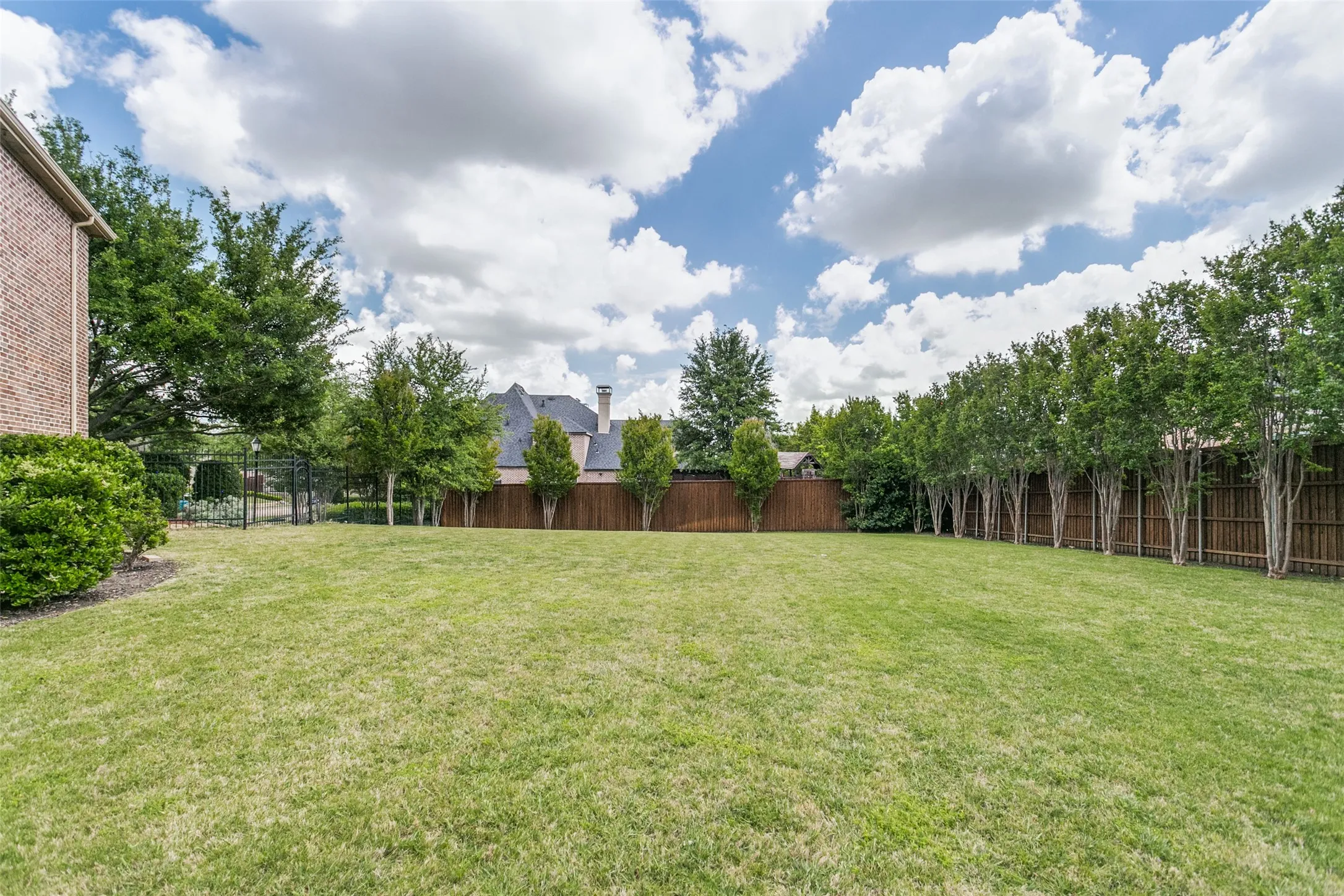 Back and Side Fenced South Lawn