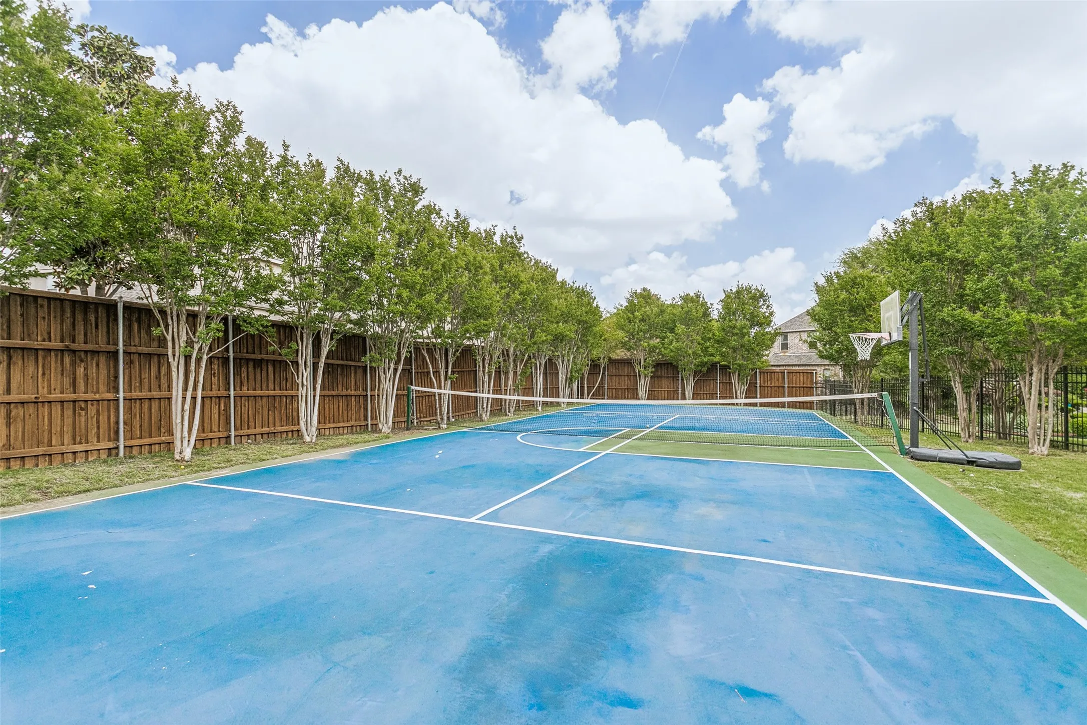Regulation-Built Tennis Court with Basketball and Pickleball Play. New Pickleball Regulation Court Lines were added April 2026