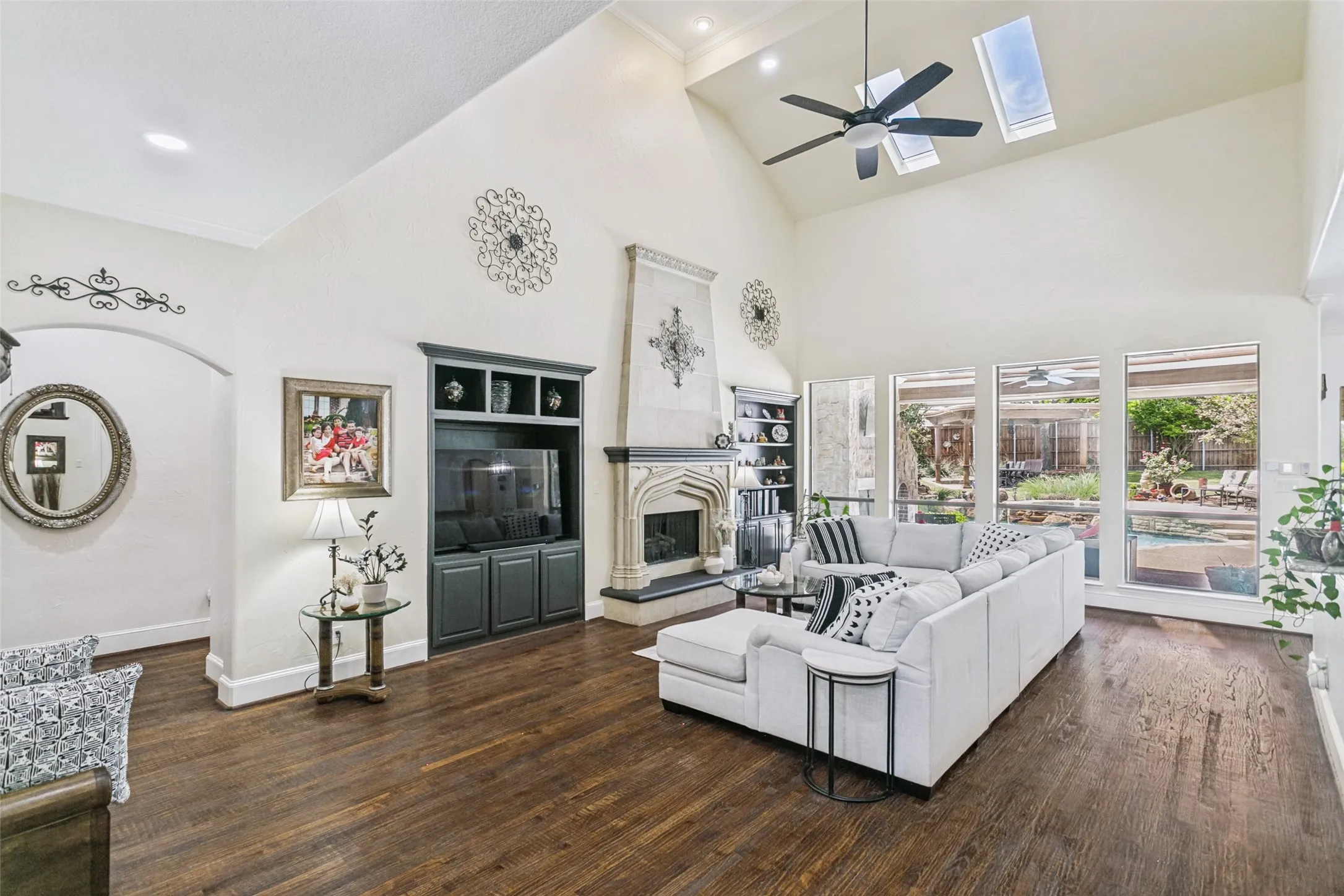 Great Room and Heart of the Home with Gas Log Fireplace and Built in Cabinetry
