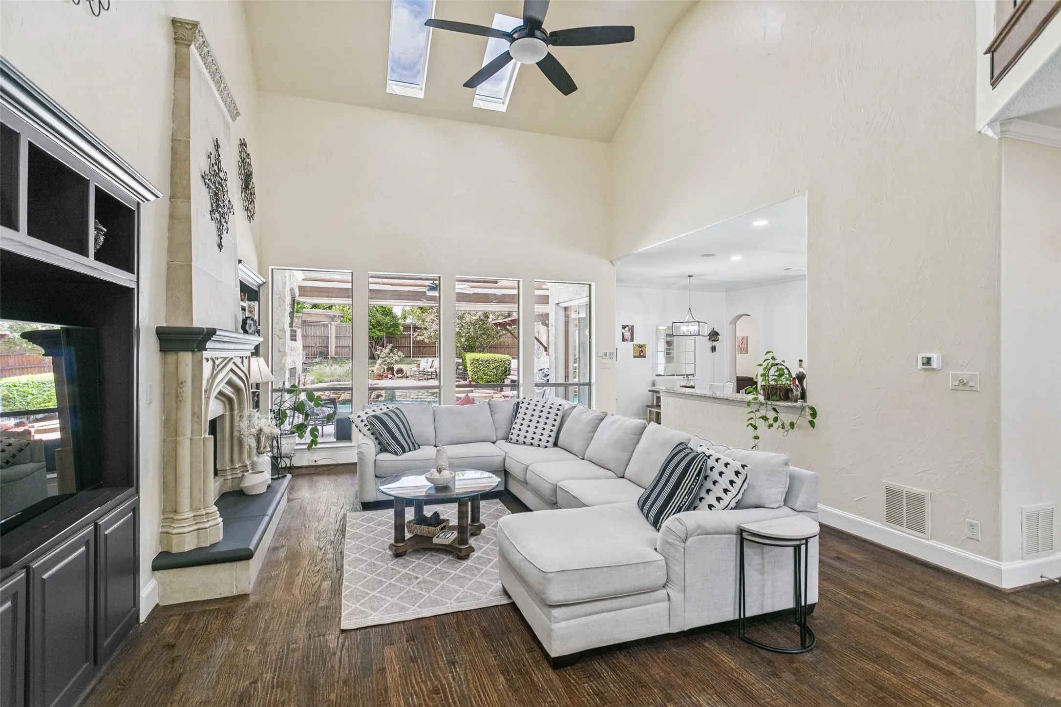 Great Room with Soaring Ceiling and Custom Skylights with Electronic Shades