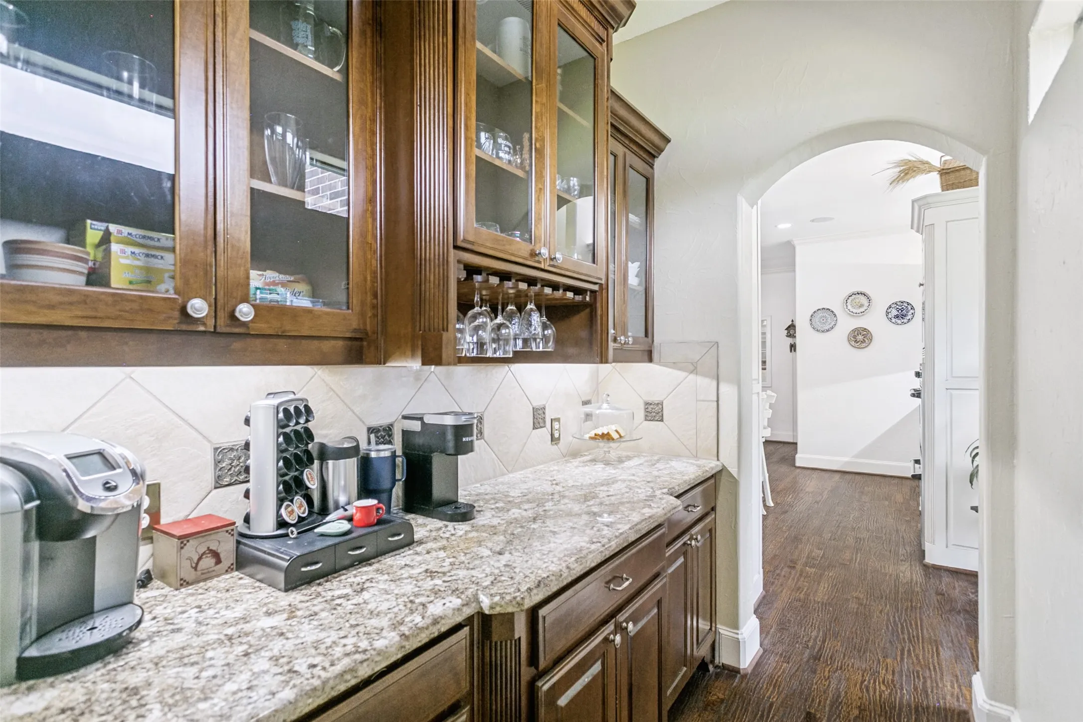 Butler's Pantry with Storage and Granite Countertop.