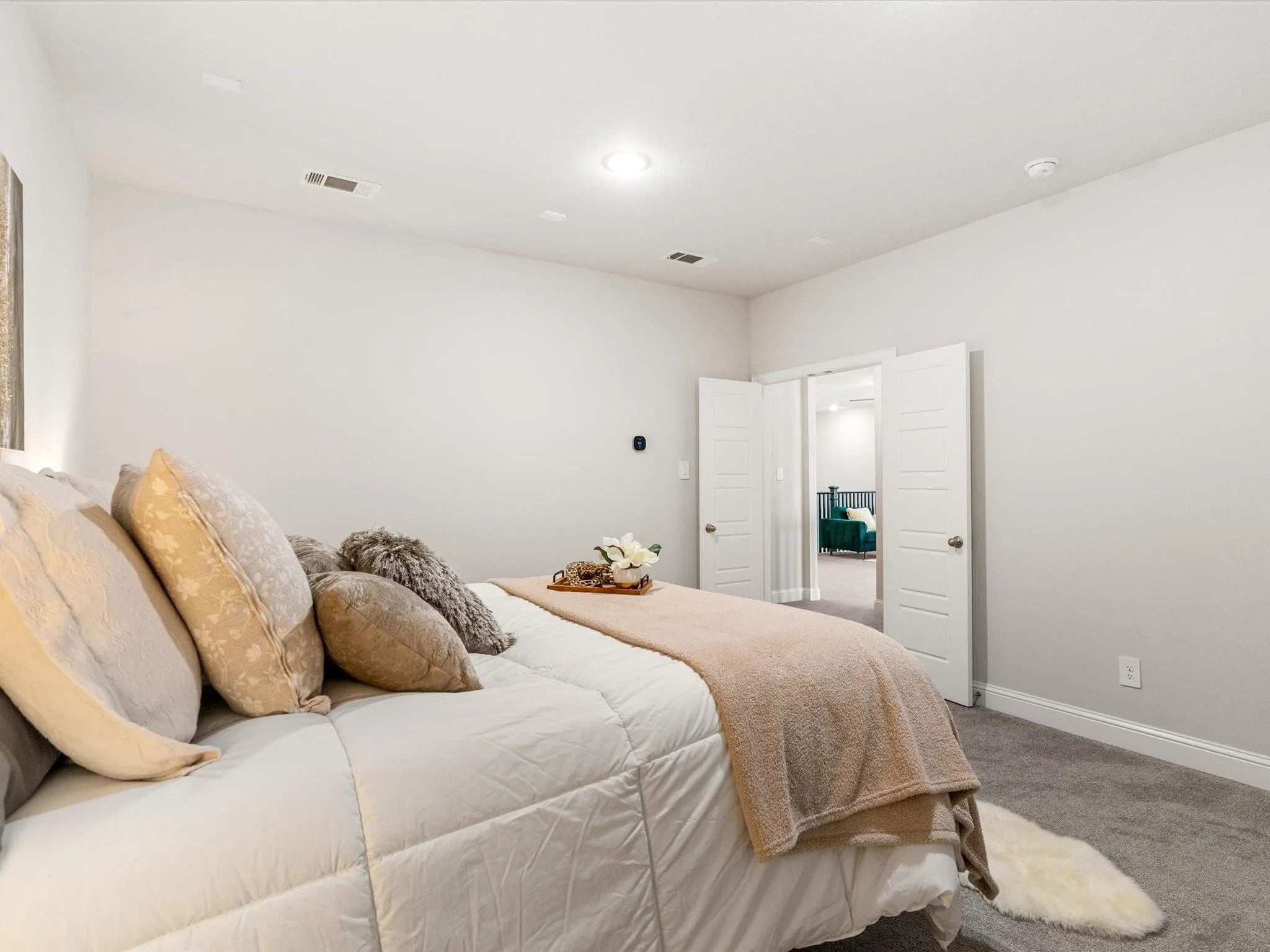 Plush gray carpet flooring paired with crisp white baseboards