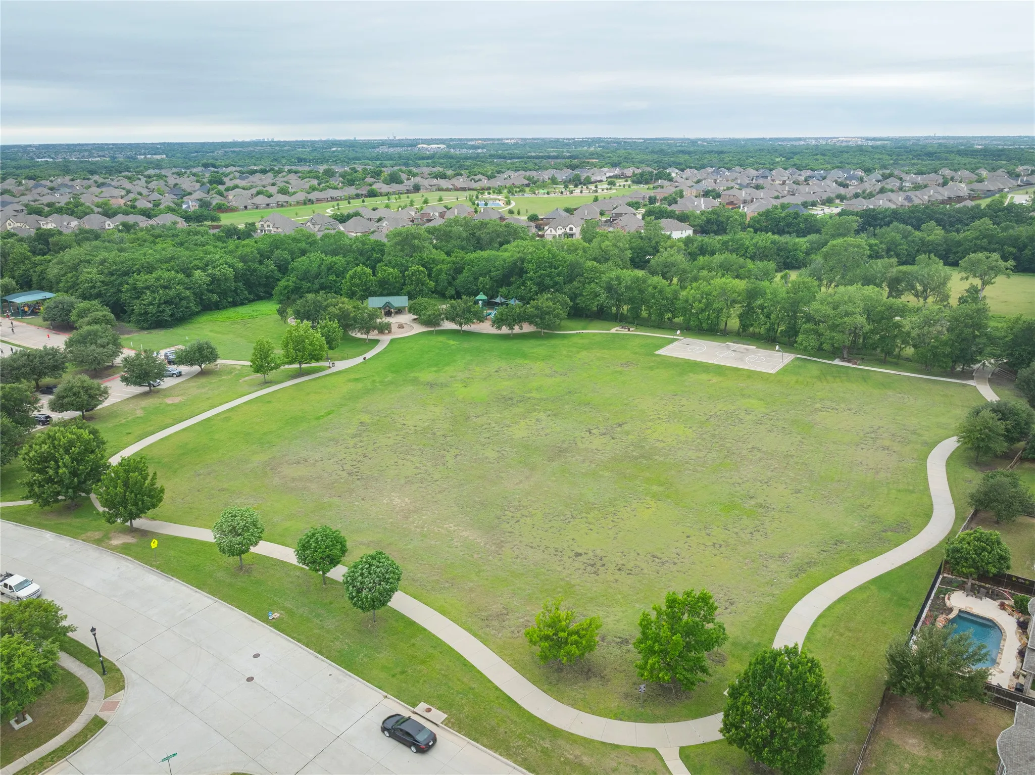 Walking trails and play structures at the neighborhood park