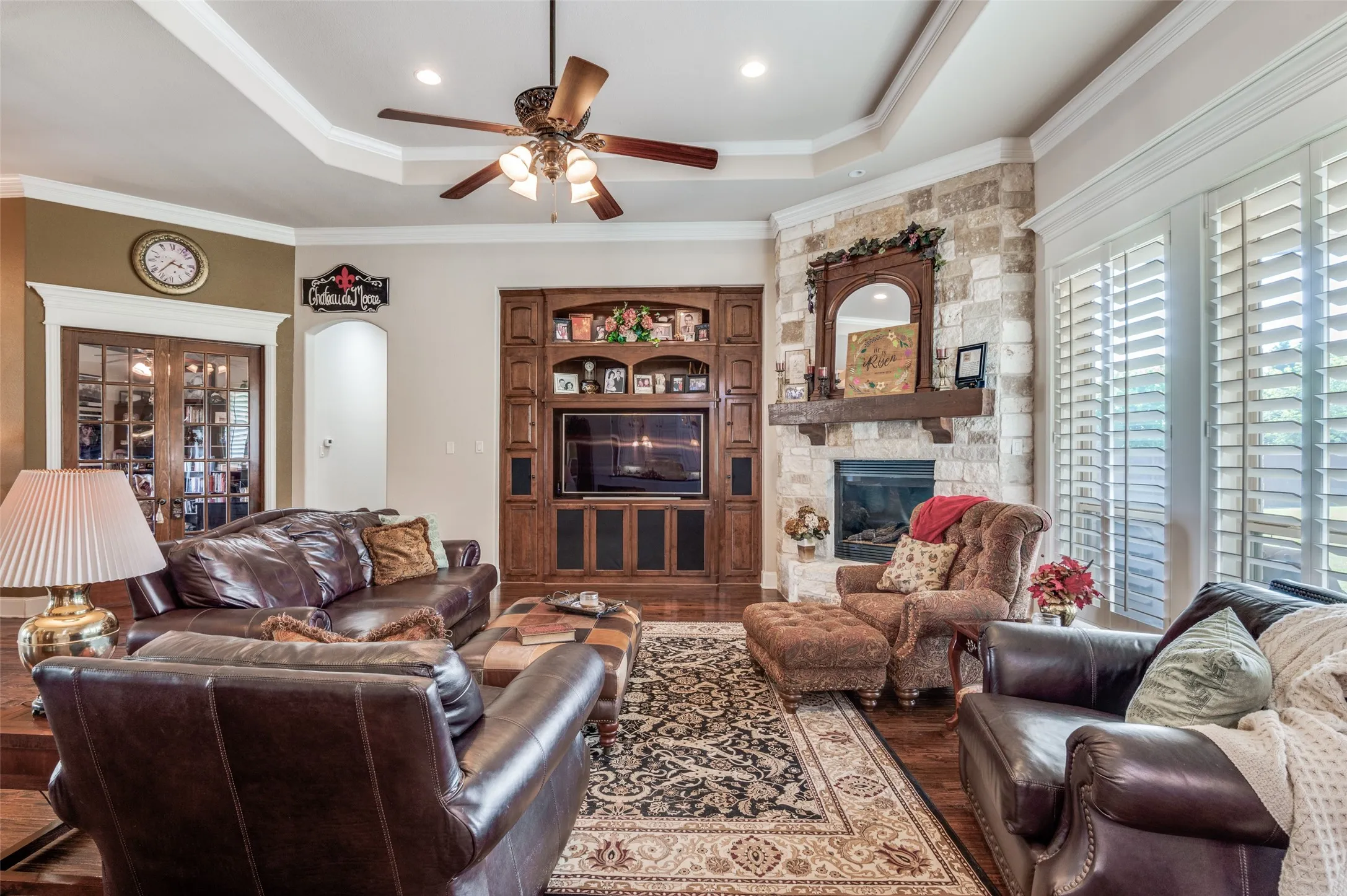 Study off to the left, hall to secondary bedrooms, built ins, gas log stone fireplace!