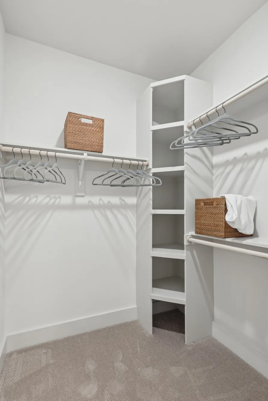 Stock image of the model apartment. Units are NOT furnished. Finishout is similar in all units.