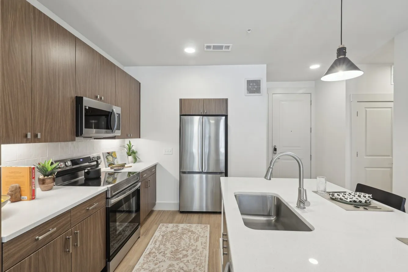 Stock image of the model apartment. Units are NOT furnished. Finishout is similar in all units.