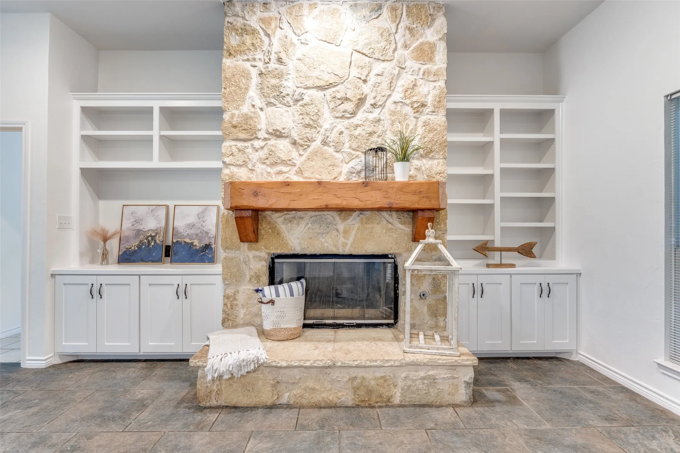 Statement fireplace and tile floors.