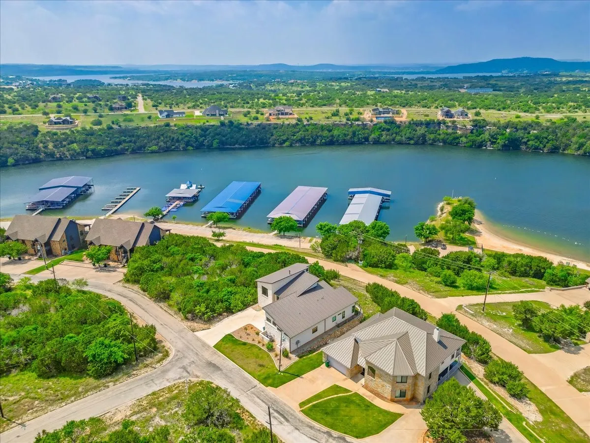 Single Family Residence For Sale in Palo Pinto County , 575 Melbourne Trail, Possum Kingdom Lake, Texas 76449, 4 Bedroom, 4 Bathroom, 2 Garage spaces, 3,000 Sqft, built in 2023, Price $1,375,000, mls#21254088, Real Estate Agent in Possum Kingdom Lake, Homes For Sale in Palo Pinto county, Homes For Sale in Possum Kingdom Lake, Realtor in Possum Kingdom Lake Texas, Real Estate Brokerage Independent Realty Texas, Luminita Cordes Realtor