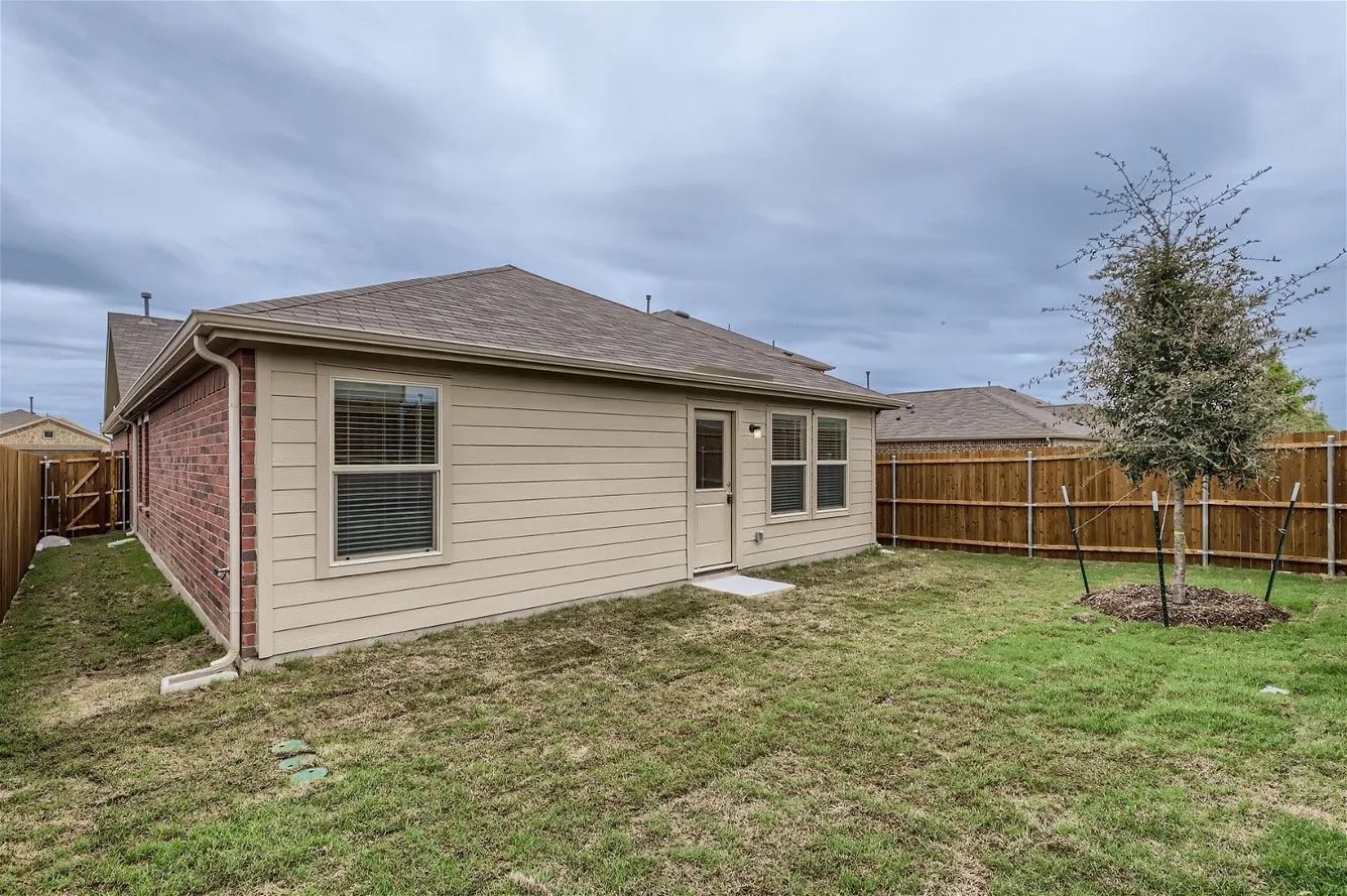 Sample Home in Neighborhood. Subject home will have same layout and finishes. Lot size varies.