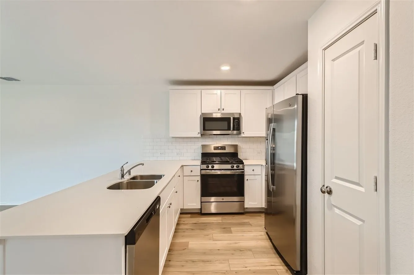 Sample Home in Neighborhood. Subject home will have same layout and finishes.
