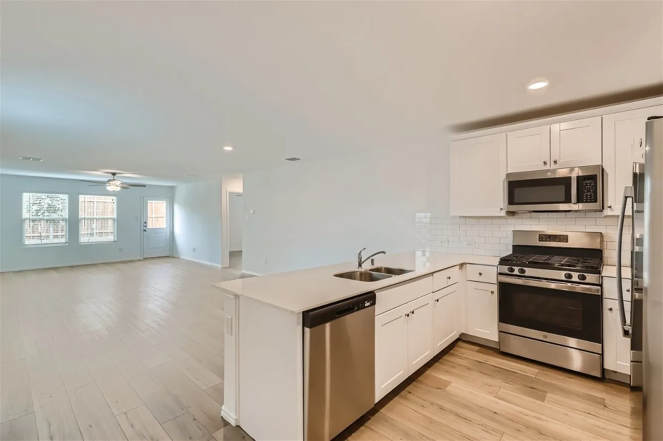 Sample Home in Neighborhood. Subject home will have same layout and finishes.