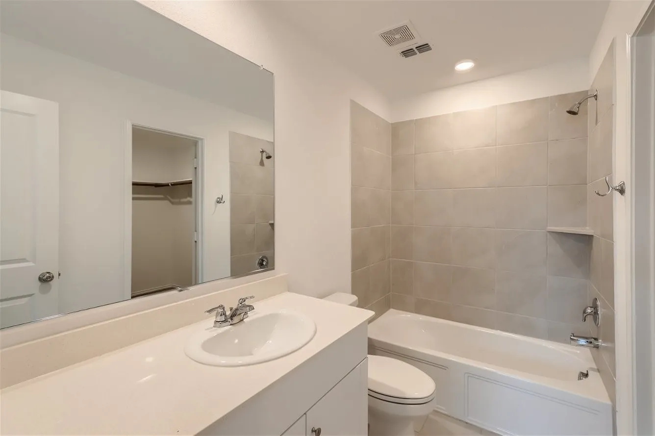 Sample Home in Neighborhood. Subject home will have same layout and finishes.