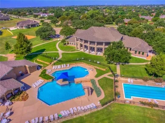 Back of the clubhouse, cabana, sand volleyball court