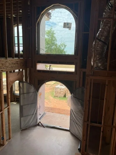 Interior Arch Front Door and Eyebrow Window