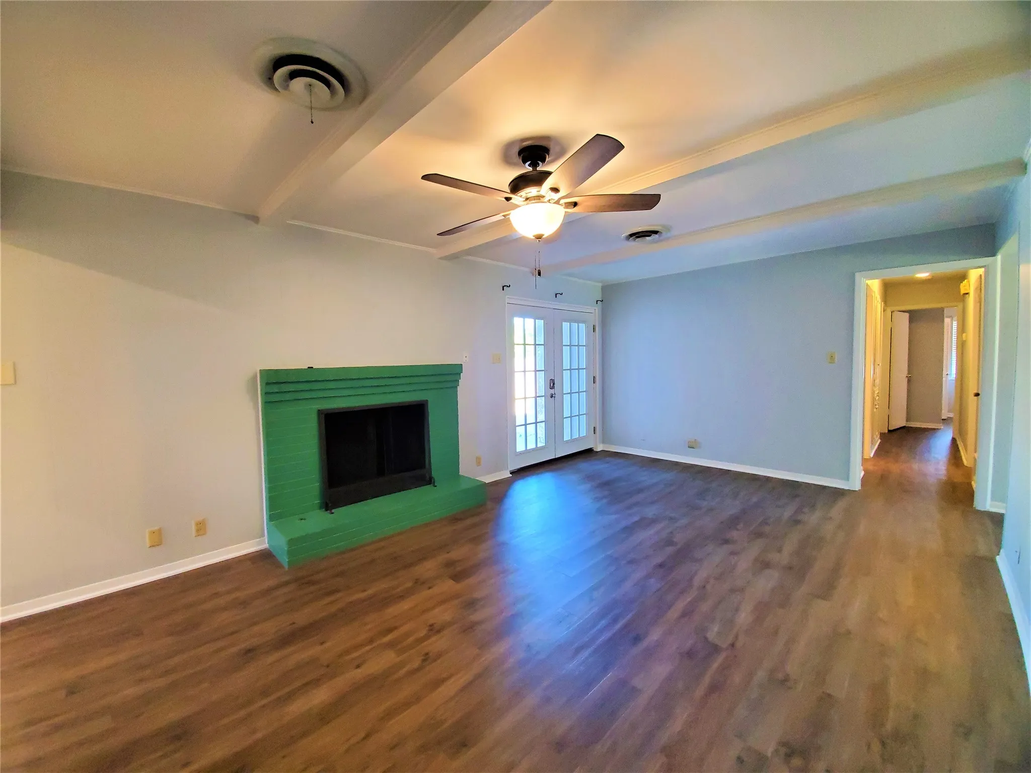 nice fireplace in family room with luxury vinal plank