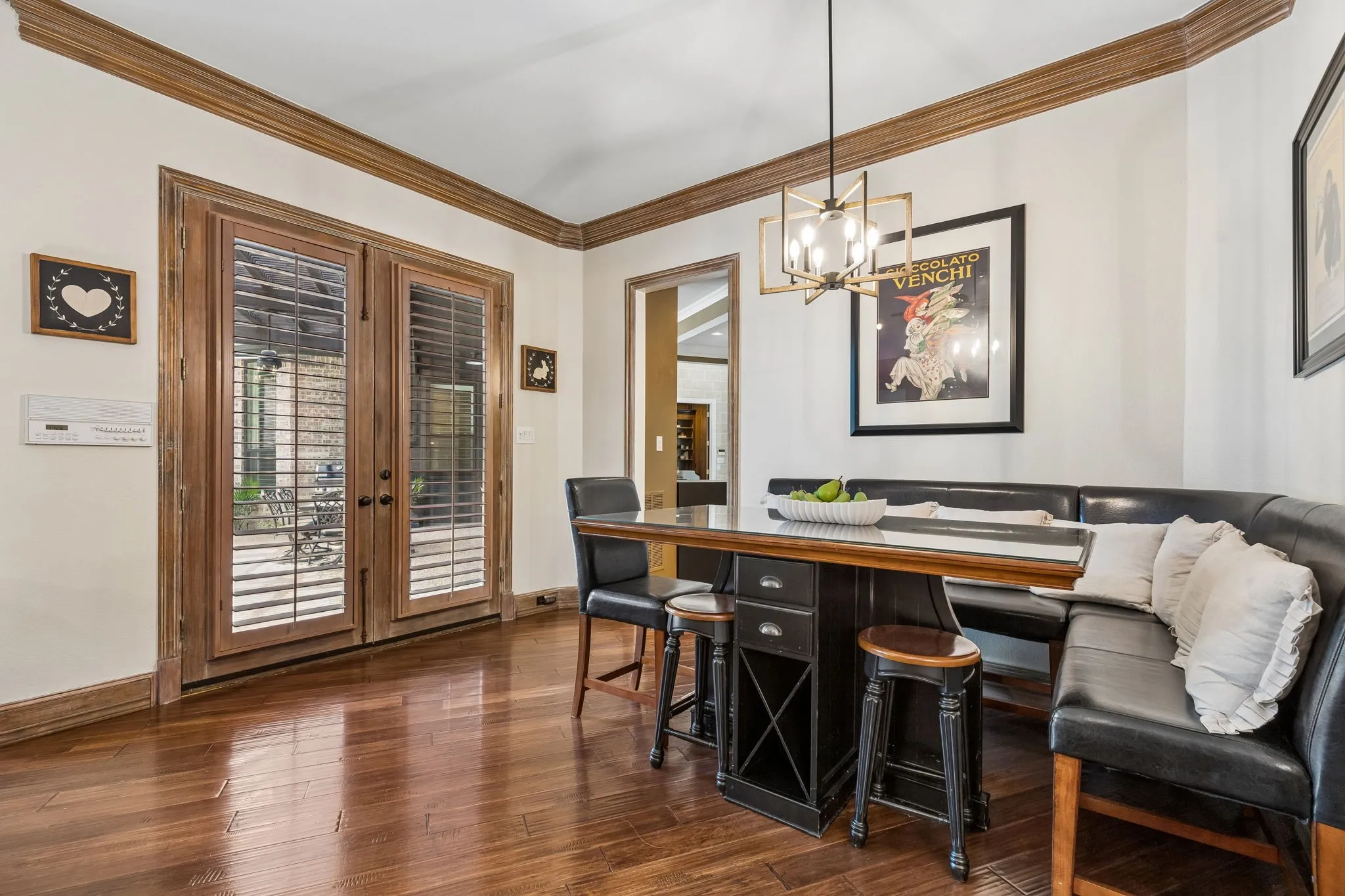 Sun filled breakfast room with exterior access to outdoor living.