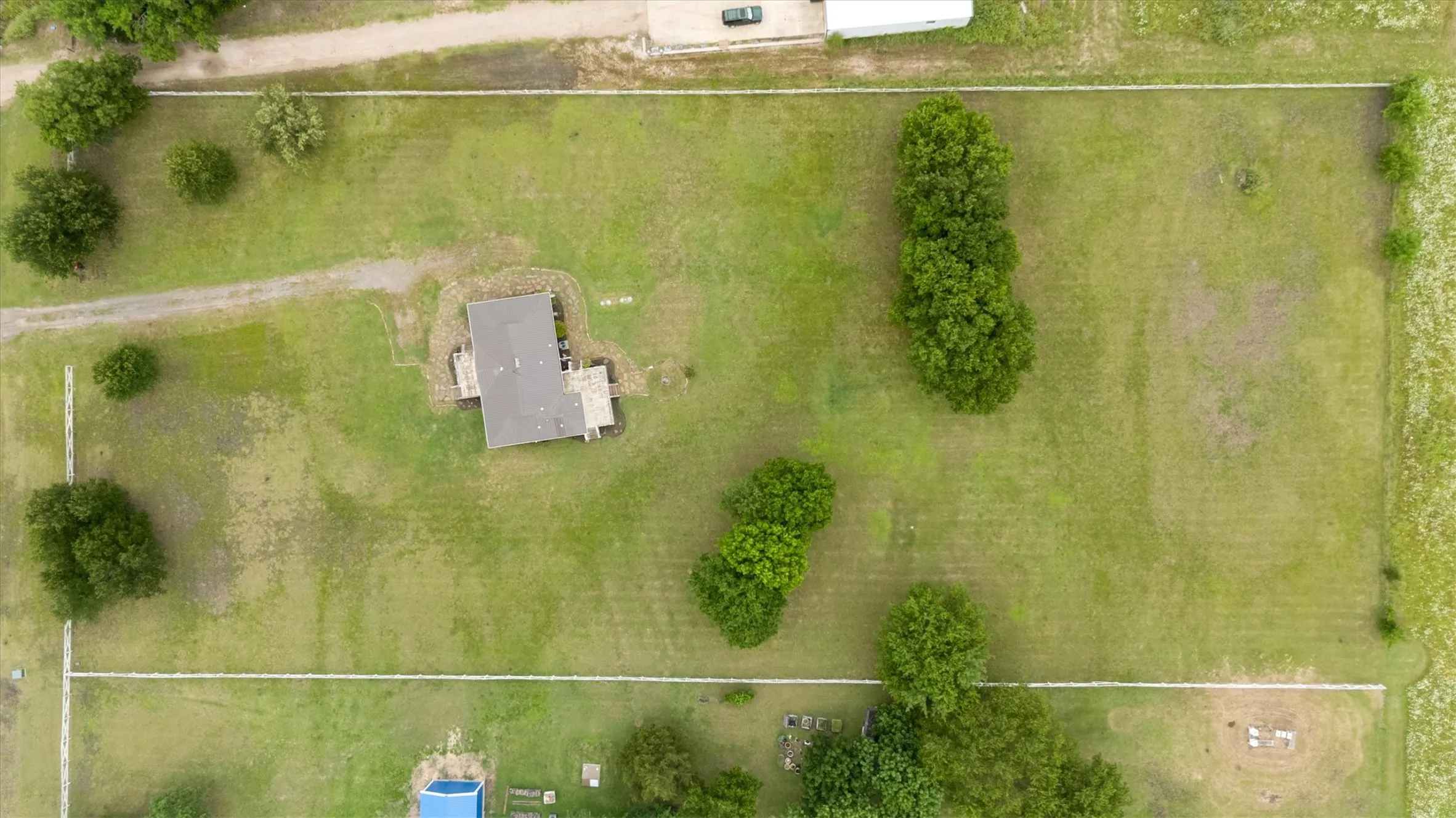 aerial of the home and some of the 9.71 acres