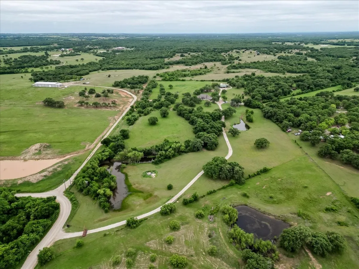 Farm For Sale in Jack County , 318 E Lone Star Road, Poolville, Texas 76487, 5 Bedroom, 5 Bathroom, 3 Garage spaces, 4,469 Sqft, built in 2006, mls#21255112, Real Estate Agent in Poolville, Homes For Sale in Jack county, Homes For Sale in Poolville, Realtor in Poolville Texas, Real Estate Brokerage Independent Realty Texas, Luminita Cordes Realtor