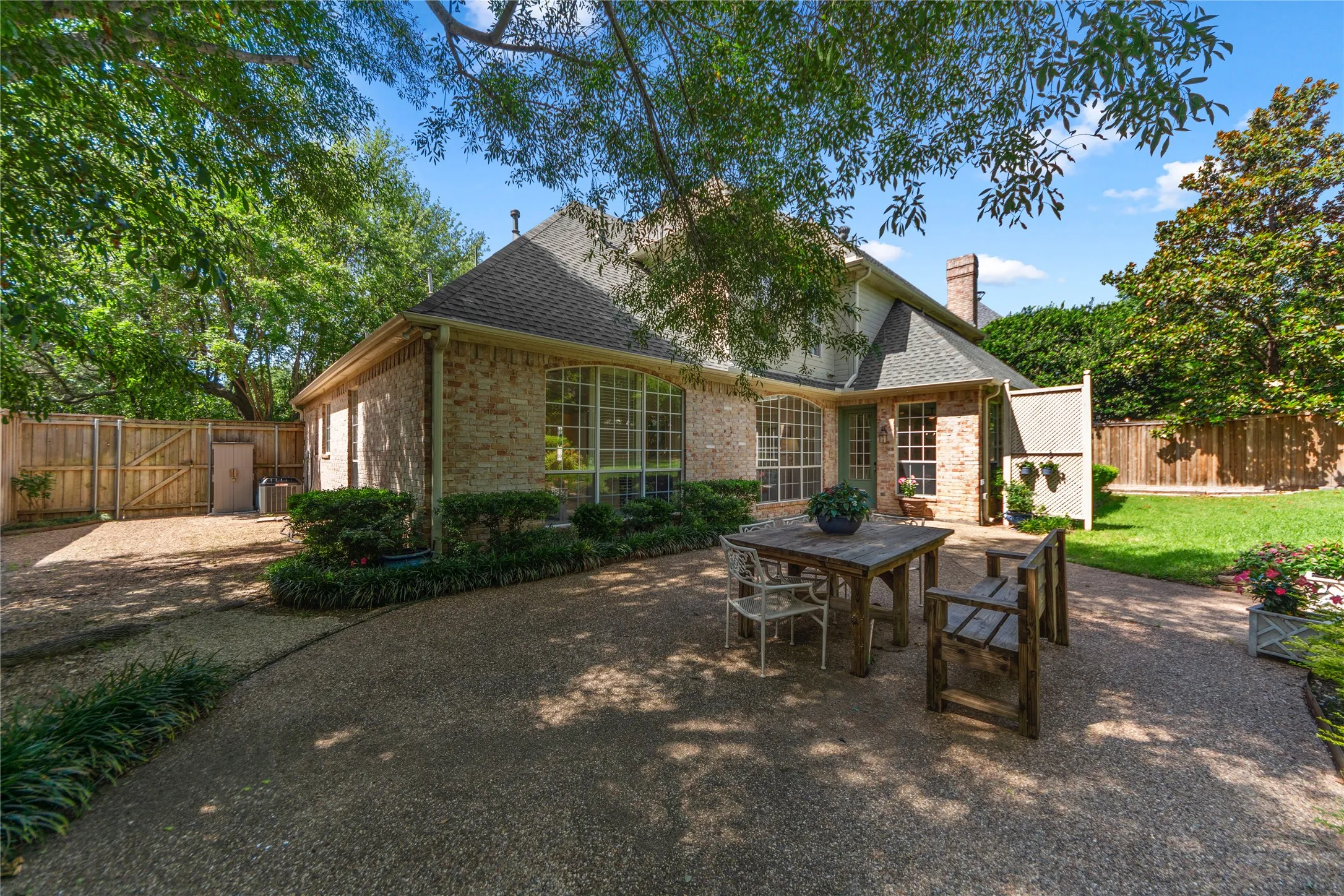 The oversized backyard is a true private retreat, surrounded by mature trees and lush landscaping that create a peaceful, resort-style setting rarely found in Dallas. Enjoy a sparkling pool, expansive patio spaces perfect for entertaining, and an additional large grassy yard with a charming deck area — ideal for outdoor gatherings, play, pets, or simply relaxing under the trees.With multiple outdoor living spaces, this home offers the perfect blend of privacy, nature, and functionality, creating an exceptional indoor-outdoor lifestyle.