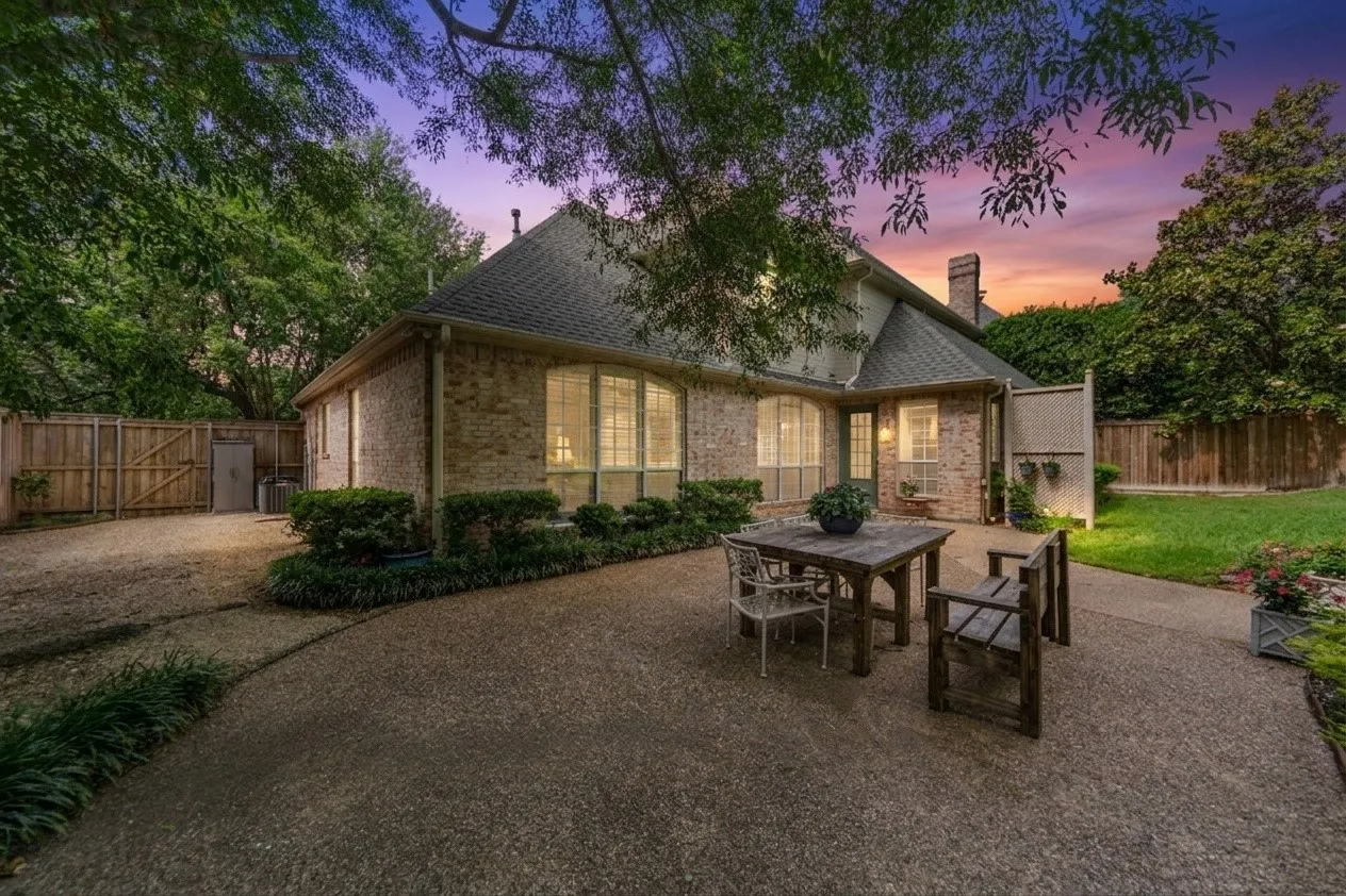 The oversized backyard is a true private retreat, surrounded by mature trees and lush landscaping that create a peaceful, resort-style setting rarely found in Dallas. Enjoy a sparkling pool, expansive patio spaces perfect for entertaining, and an additional large grassy yard with a charming deck area — ideal for outdoor gatherings, play, pets, or simply relaxing under the trees.With multiple outdoor living spaces, this home offers the perfect blend of privacy, nature, and functionality, creating an exceptional indoor-outdoor lifestyle.