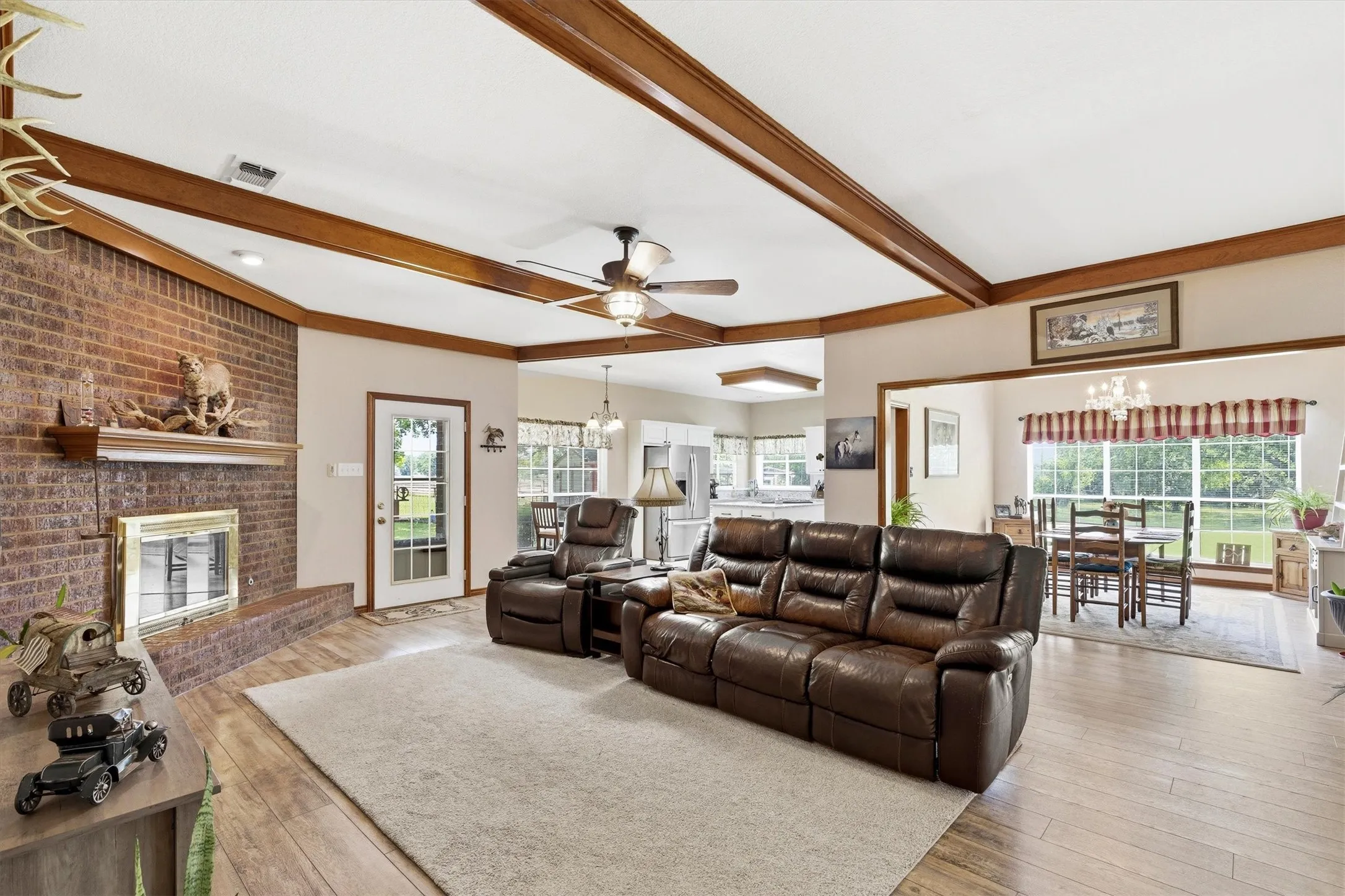 Living room - wood beam ceilings - fireplace
